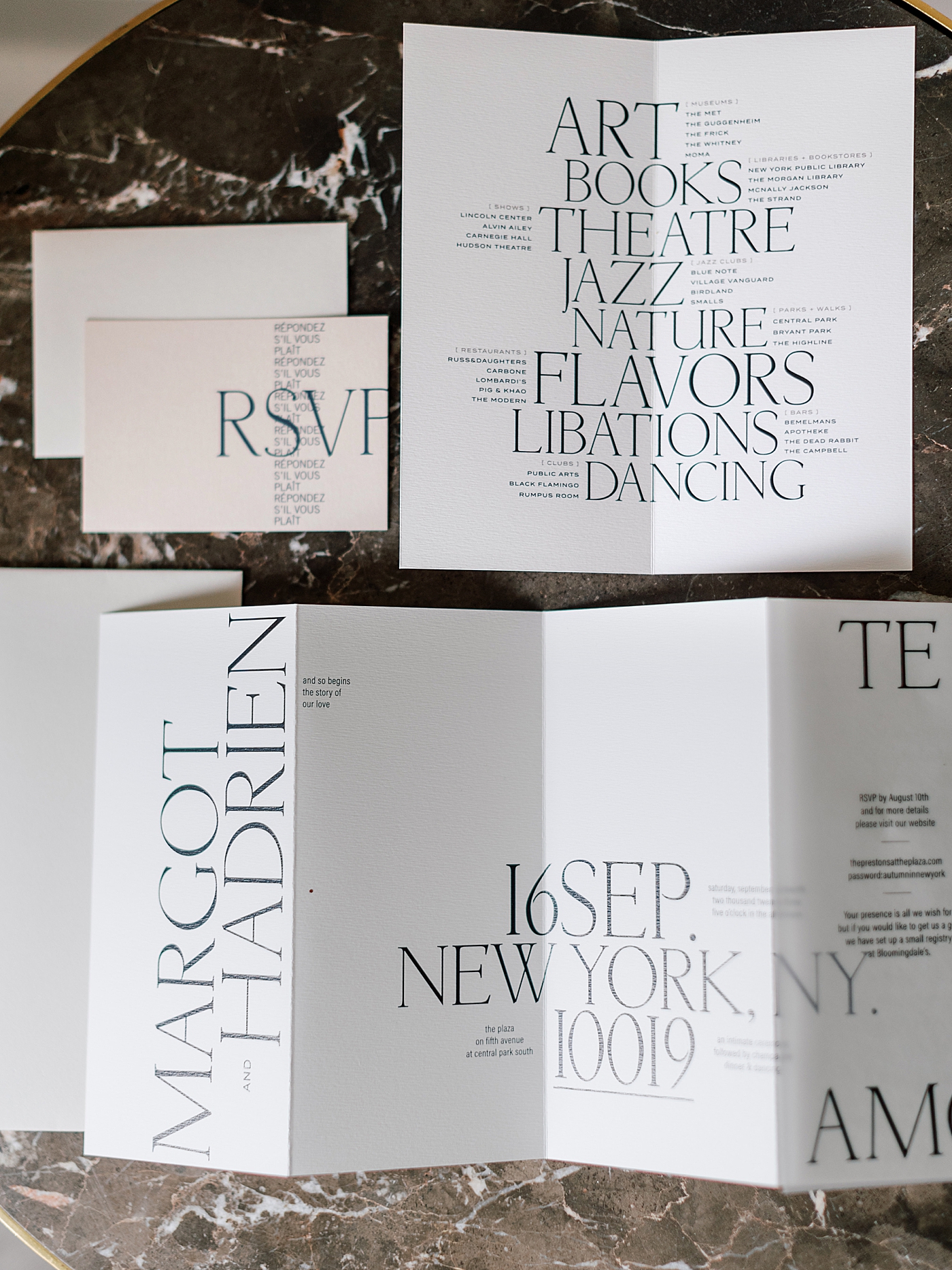 Invitation suite on a marble background | Photo by NYC Wedding Photographer Hope Helmuth