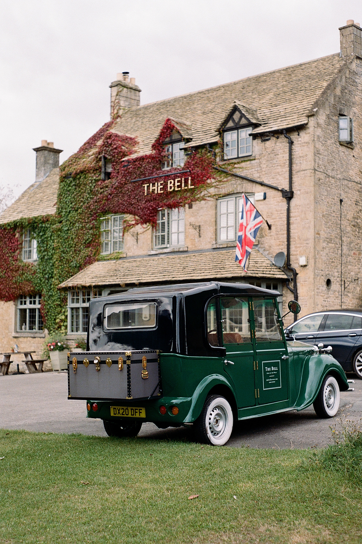 Green vintage car at The Bell in the Cotswolds | Photo by Hope Helmuth Photography