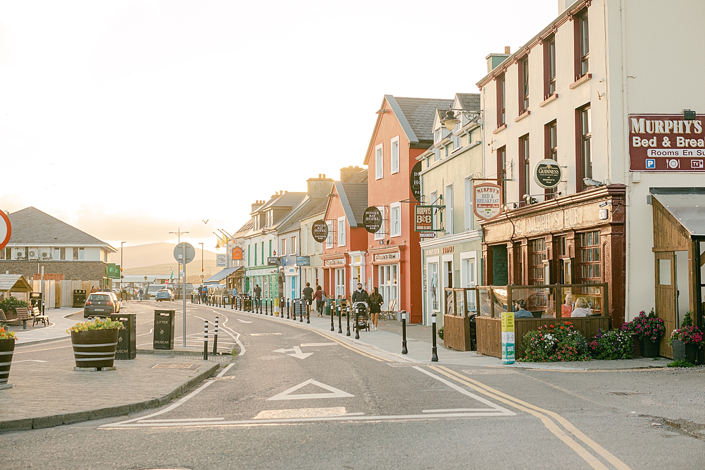 Colorful buildings in a coastal town in Ireland | Photo by Destination Wedding Photographer Hope Helmuth