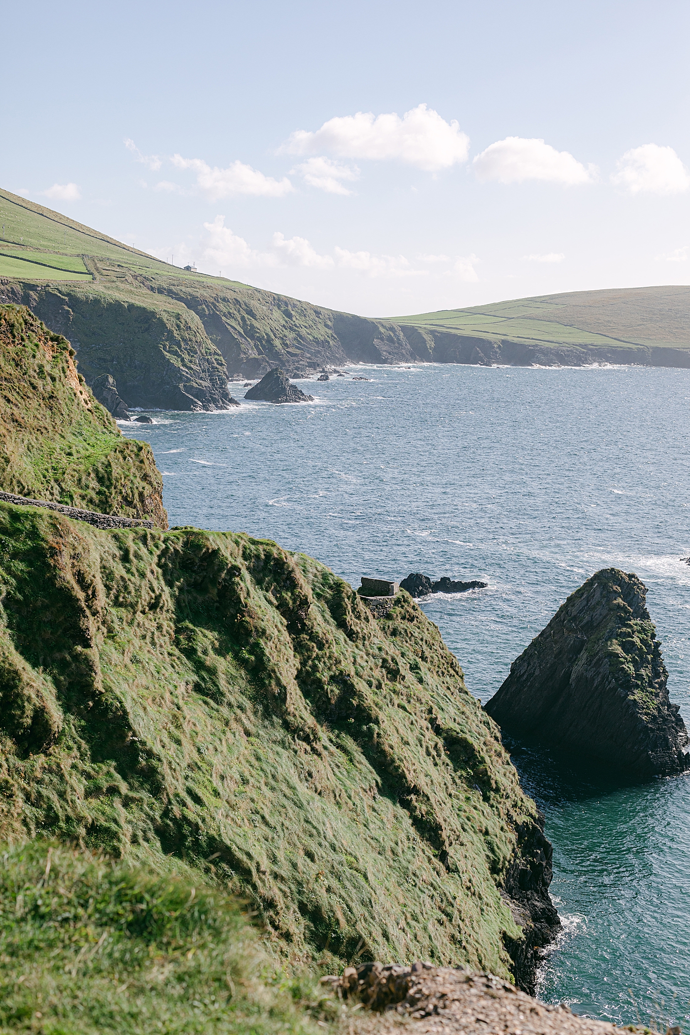 The coast of Ireland in the sun | Photo by Destination Wedding Photographer Hope Helmuth