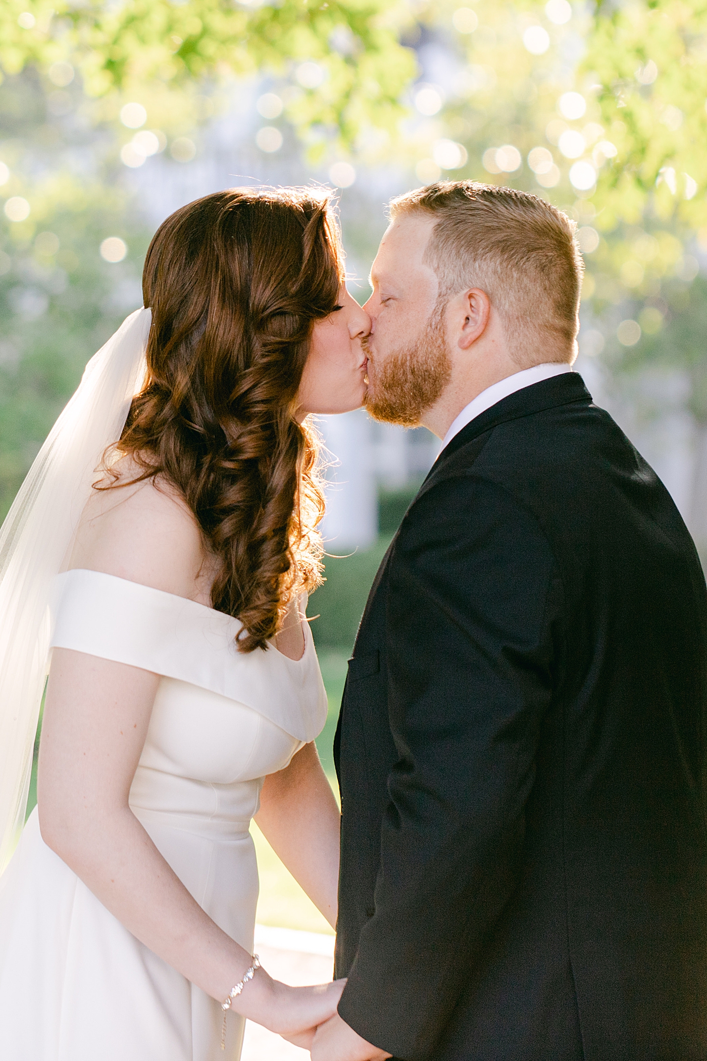 Bride and groom kissing after their Inn at perry cabin wedding | Photo by Hope Helmuth Photography