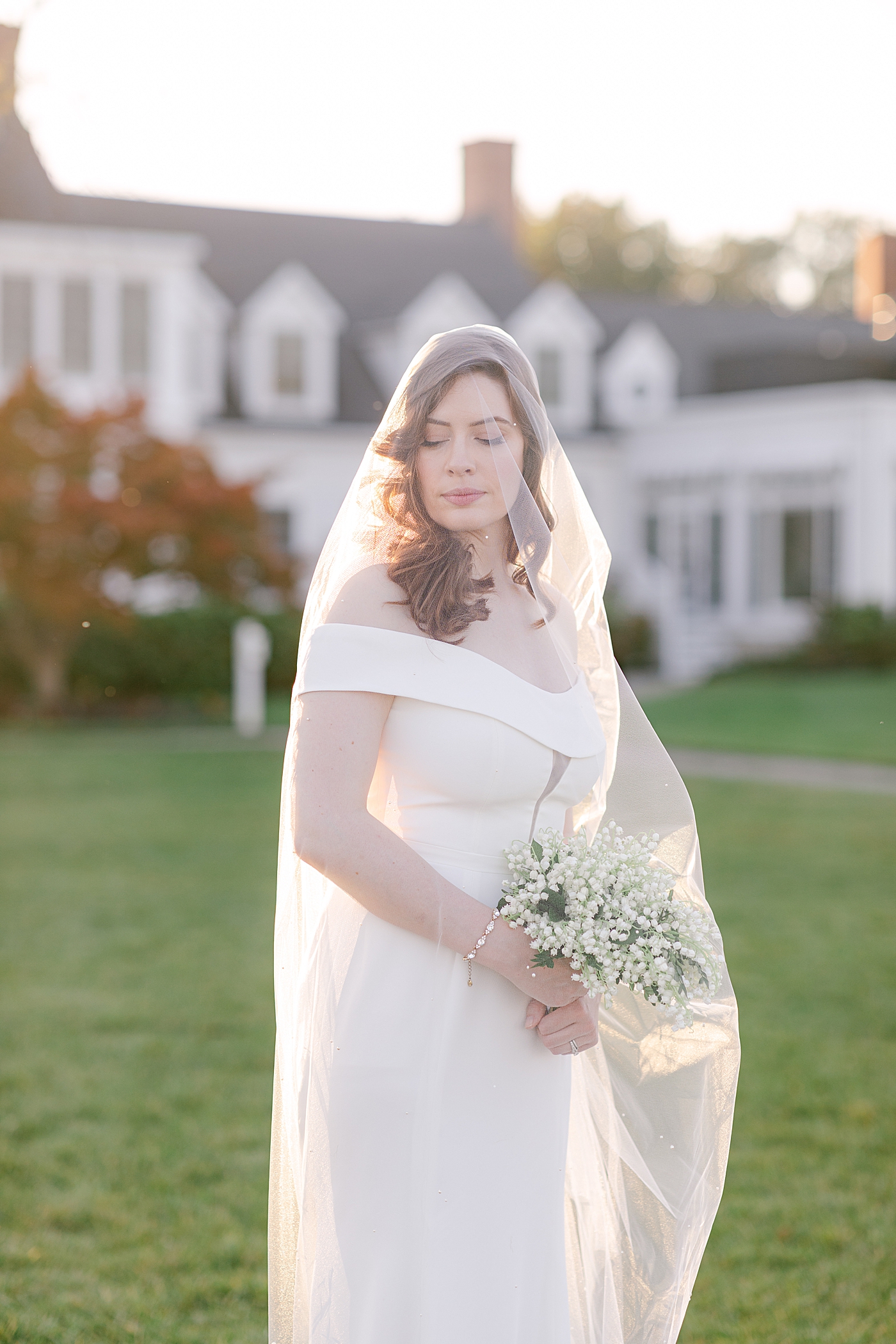 Bride posing for a portrait after her Inn at perry cabin wedding | Photo by Hope Helmuth Photography