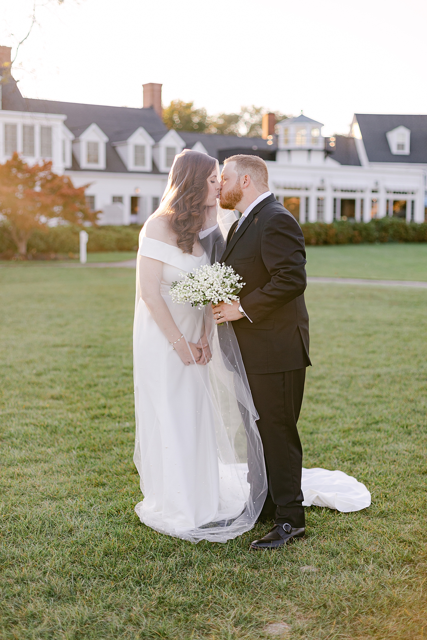 Bride and groom kissing after their Inn at perry cabin wedding | Photo by Hope Helmuth Photography