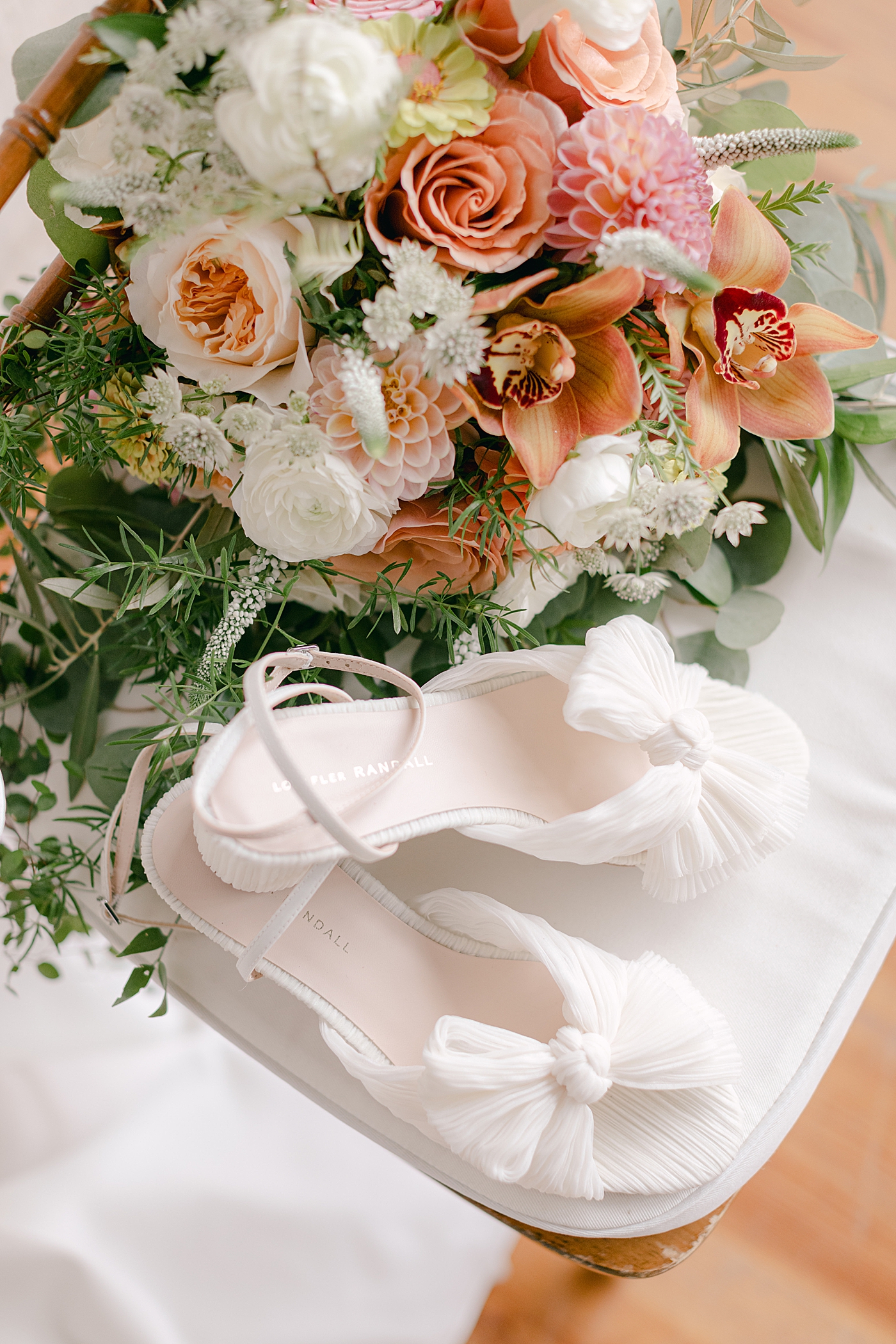 White bridal shoes with bouquet | Excelsior PA Wedding Photography by Hope Helmuth Photography