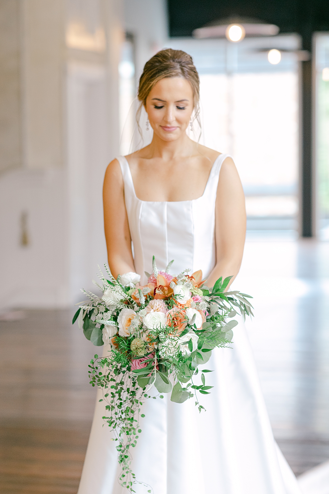 Bride holding her bouquet during portraits | Excelsior PA Wedding Photography by Hope Helmuth Photography