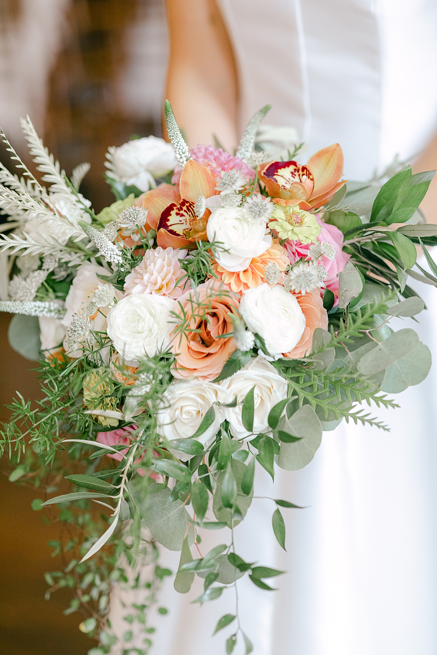 Colorful bridal bouquet with orchids and greenery | Excelsior PA Wedding Photography by Hope Helmuth Photography