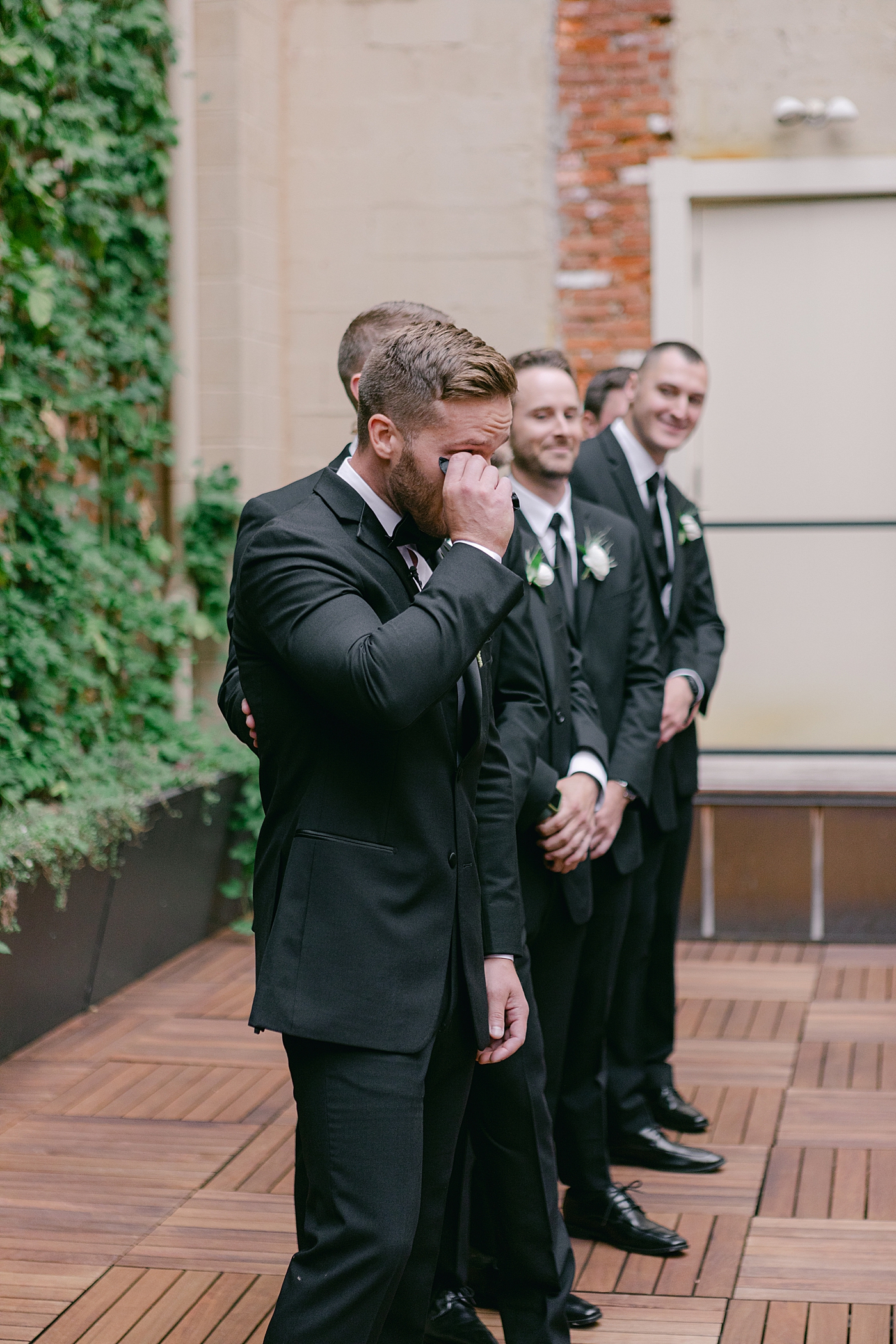 Groom wiping tears as the bride walks down the aisle | Excelsior PA Wedding Photography by Hope Helmuth Photography