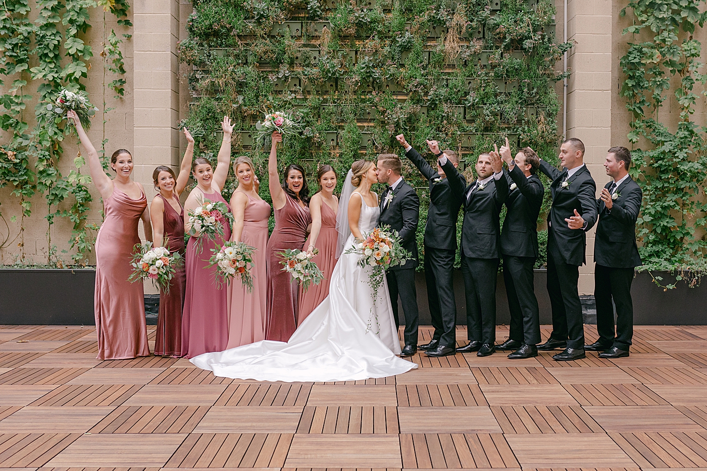 Wedding party cheering as bride and groom kiss | Excelsior PA Wedding Photography by Hope Helmuth Photography