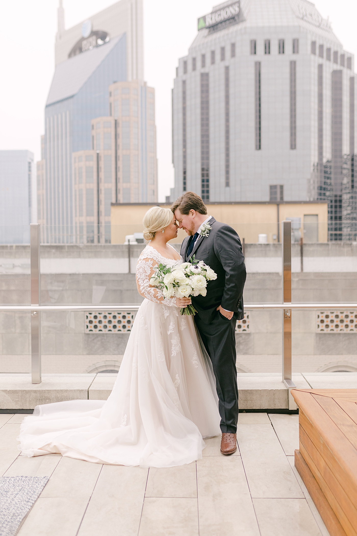 Bride and groom portraits on a rooftop in Nashville | Photo by Hope Helmuth Photography
