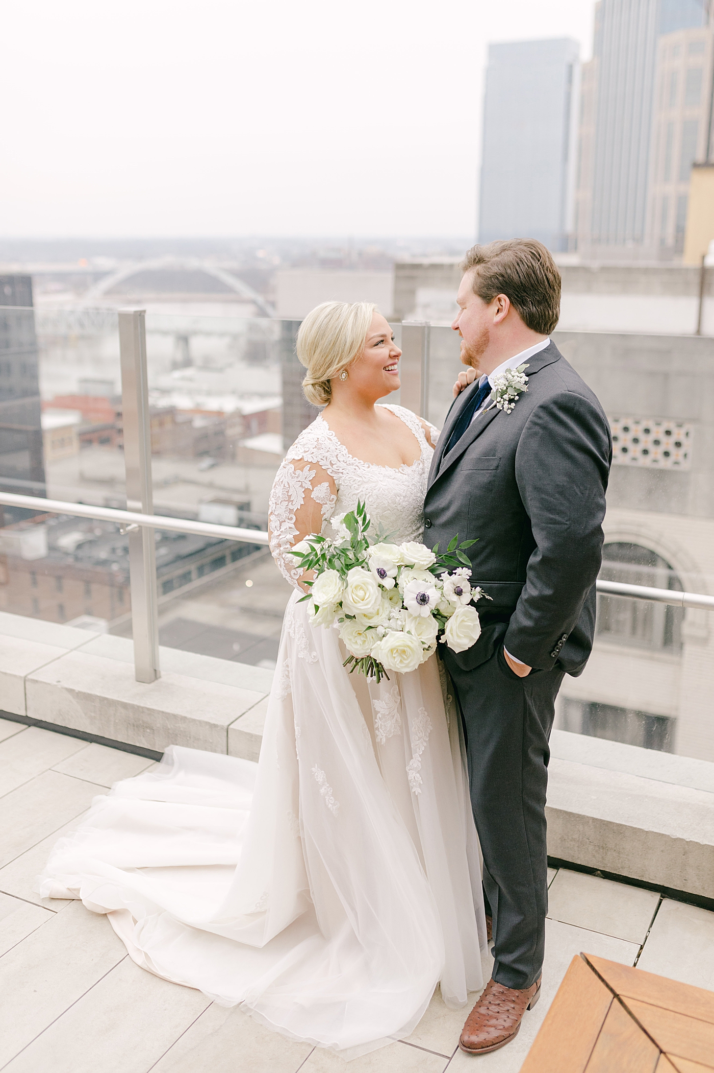Bride and groom together on a rooftop during Noelle, Nashville Wedding | Photo by Hope Helmuth Photography
