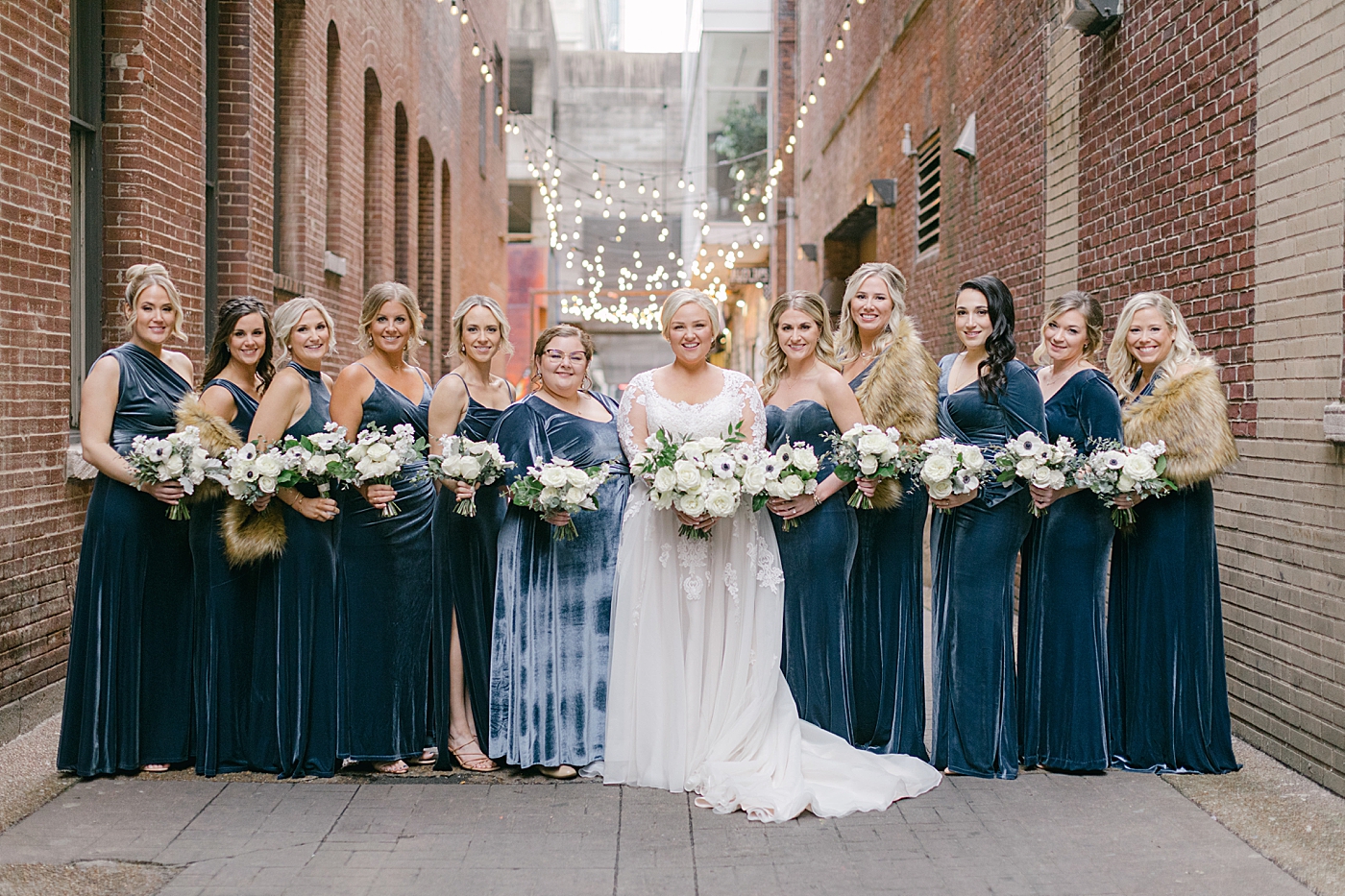 Bridal party photos at Printers Alley in Nashville | Photo by Hope Helmuth Photography