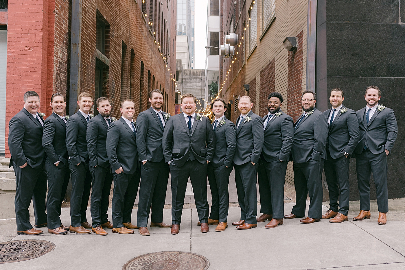 Groomsmen photos in Printers Alley | Photo by Hope Helmuth Photography