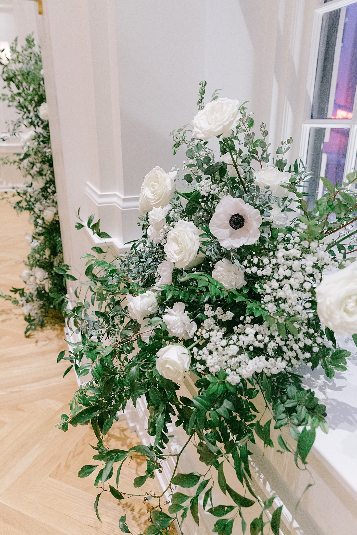 Floral installation of white flowers during Noelle, Nashville Wedding | Photo by Hope Helmuth Photography