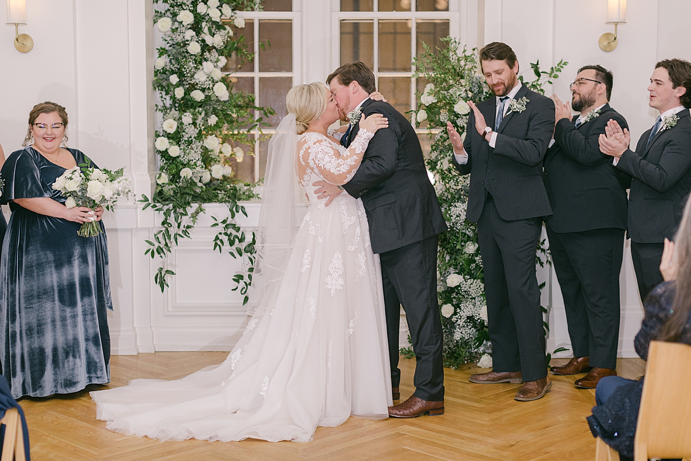 Bride and groom first kiss during Noelle, Nashville Wedding | Photo by Hope Helmuth Photography