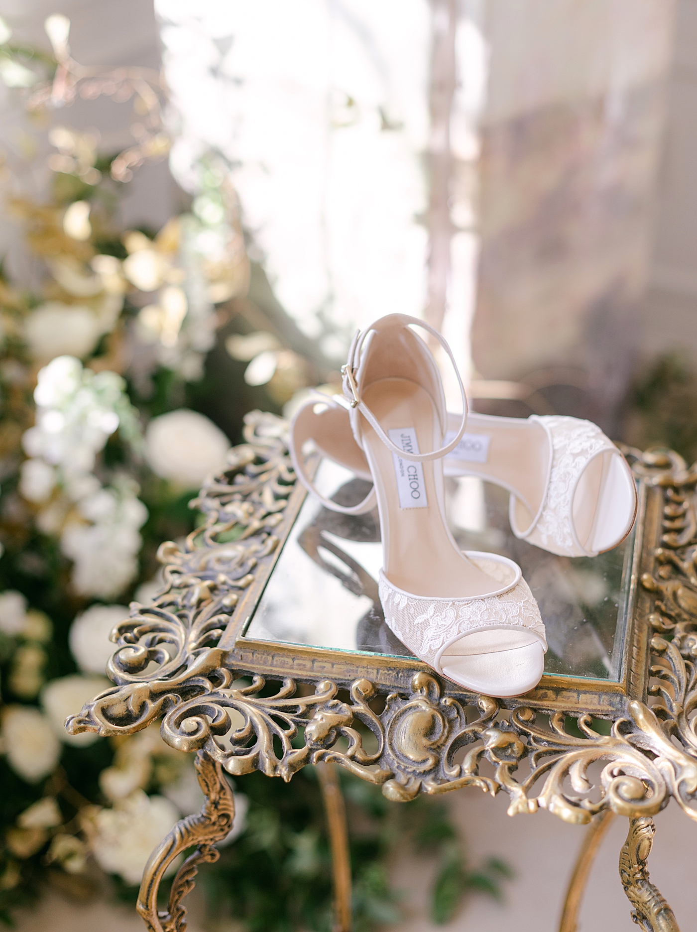 Jimmy Choo heels styled on a glass table during Old World Romance Editorial | Photo by Hope Helmuth Photograpghy
