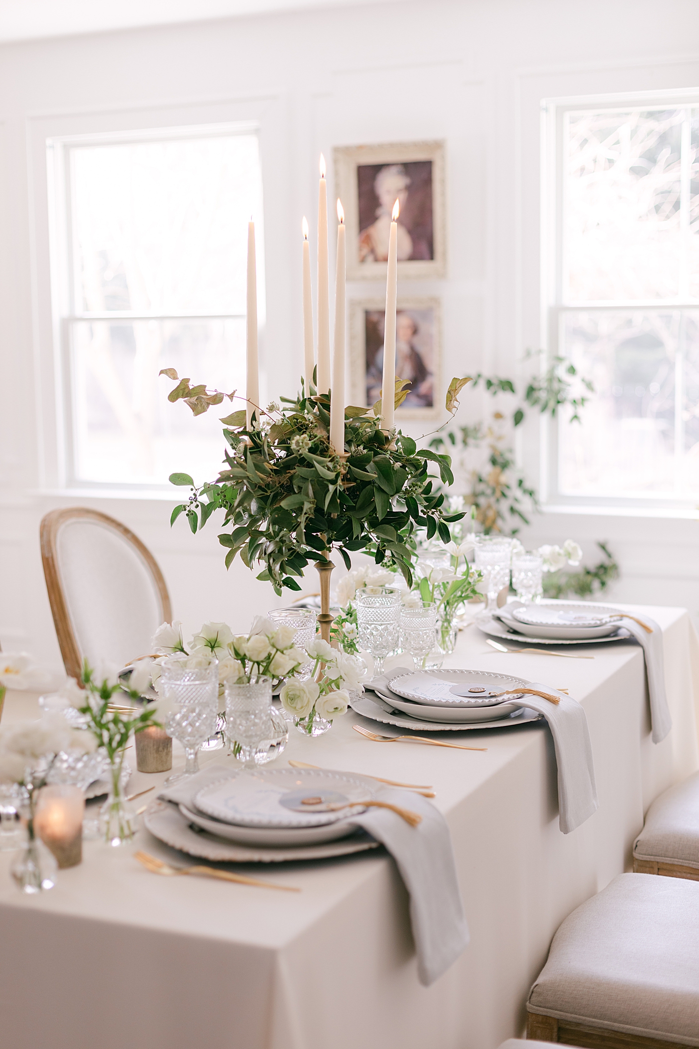 Table with greenery and tapered candles during Old World Romance Editorial | Photo by Hope Helmuth Photograpghy