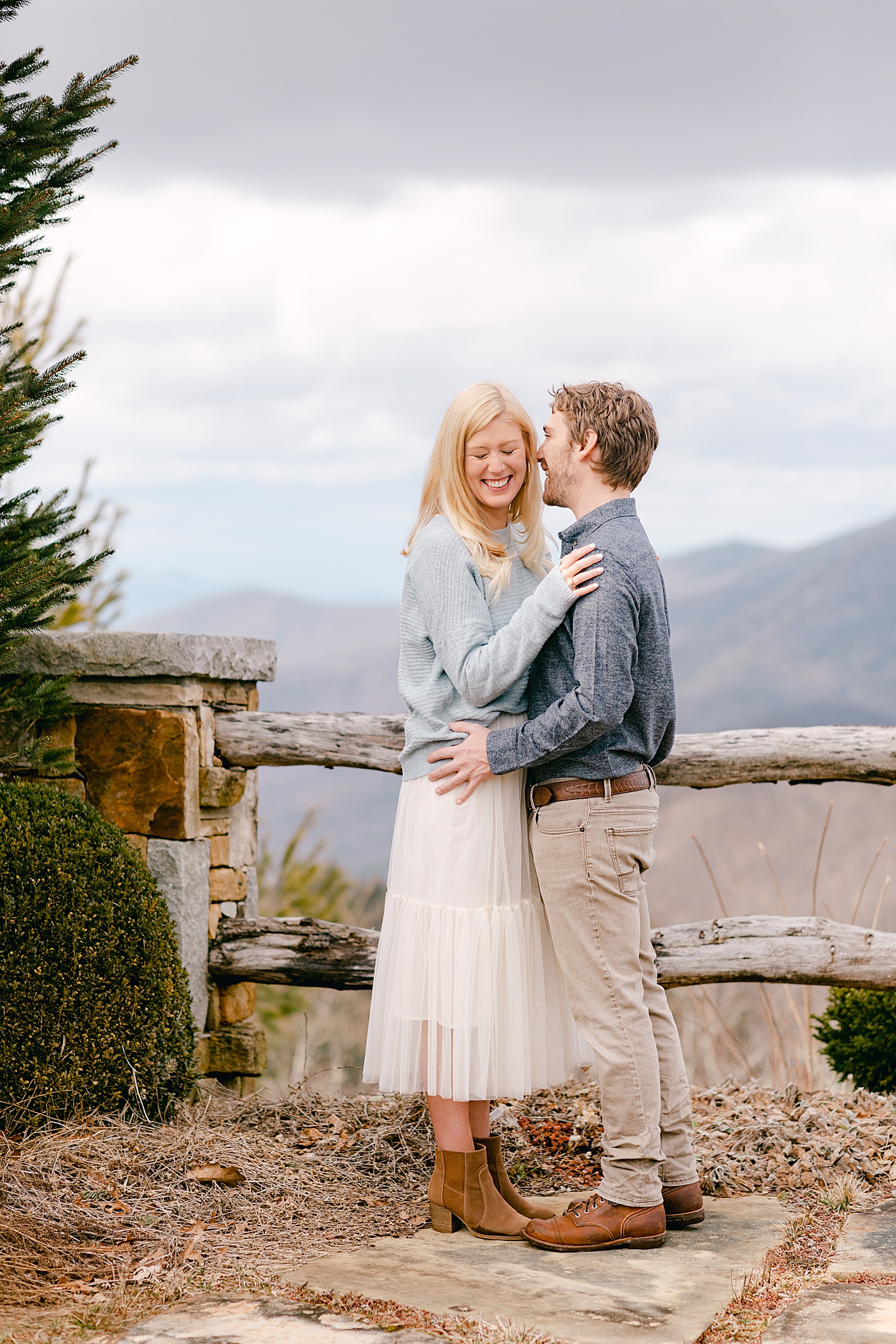Couple laughing together | Image by Hope Helmuth Photography