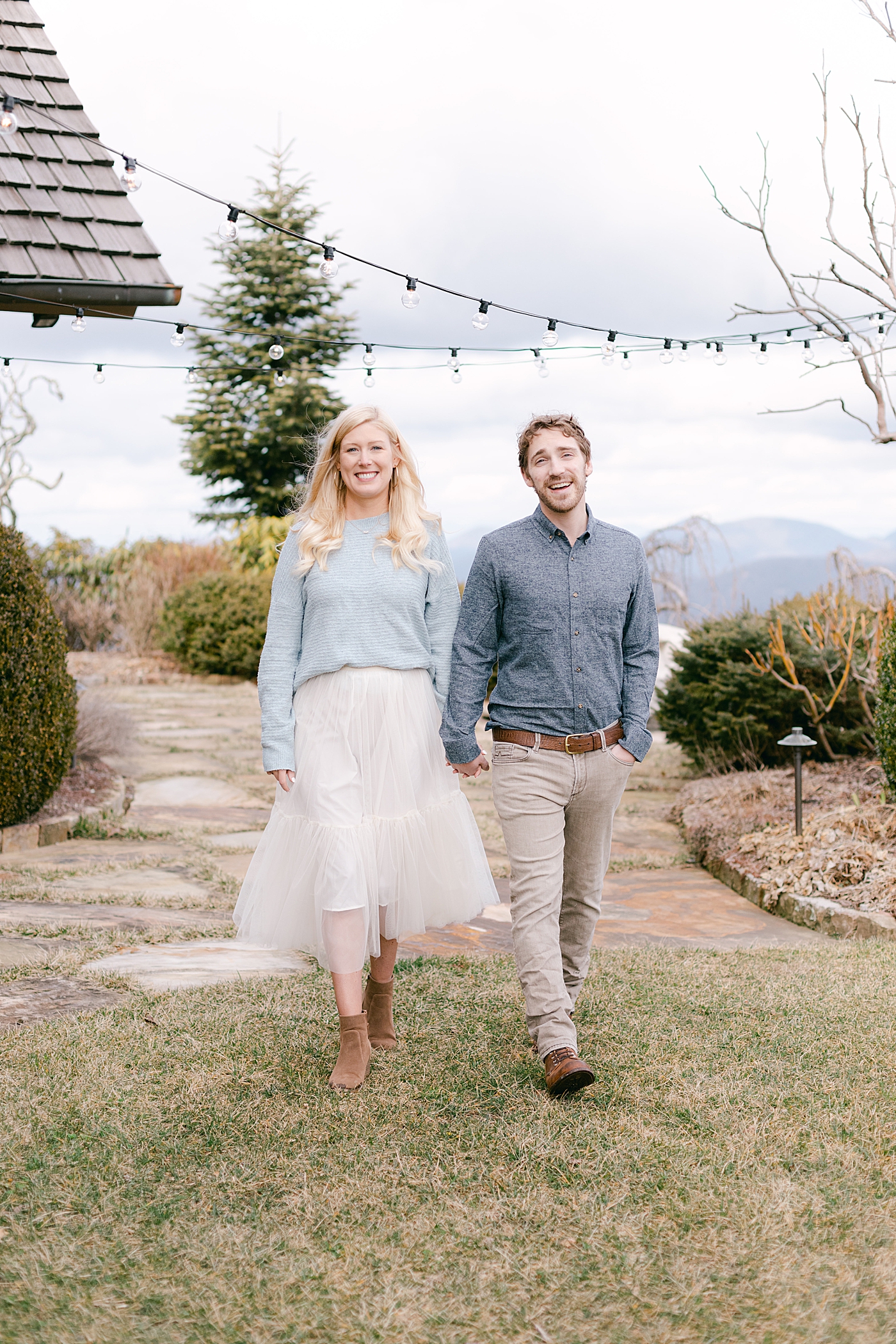 Couple walking together during their Highlands Engagement Session | Image by Hope Helmuth Photography
