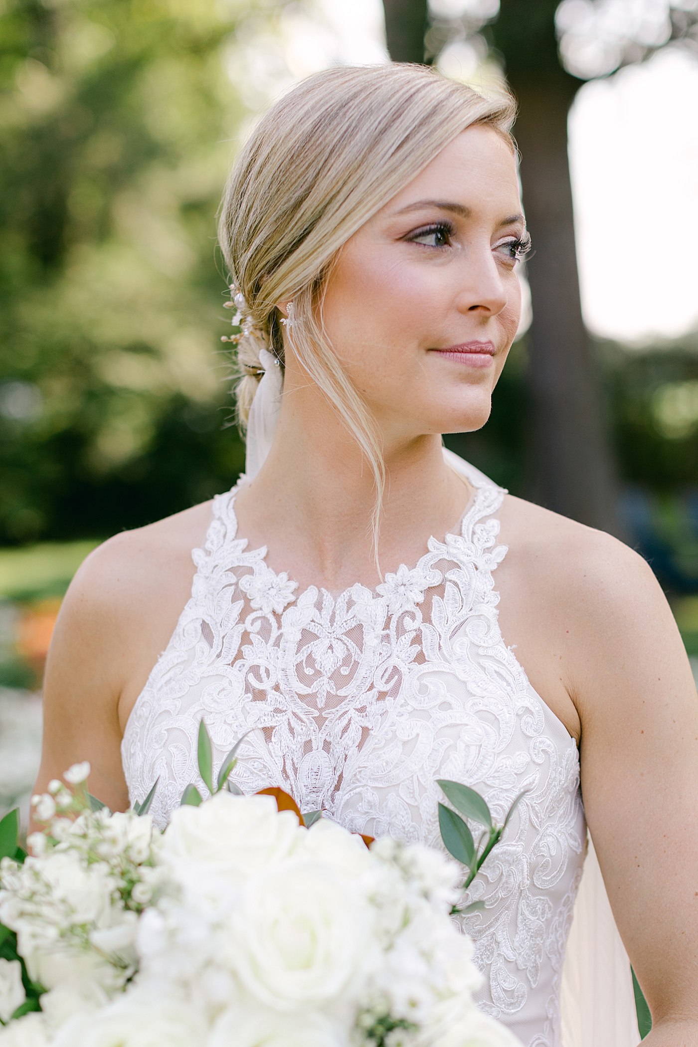 Bride looking over her shoulder | Image by Hope Helmuth Photography
