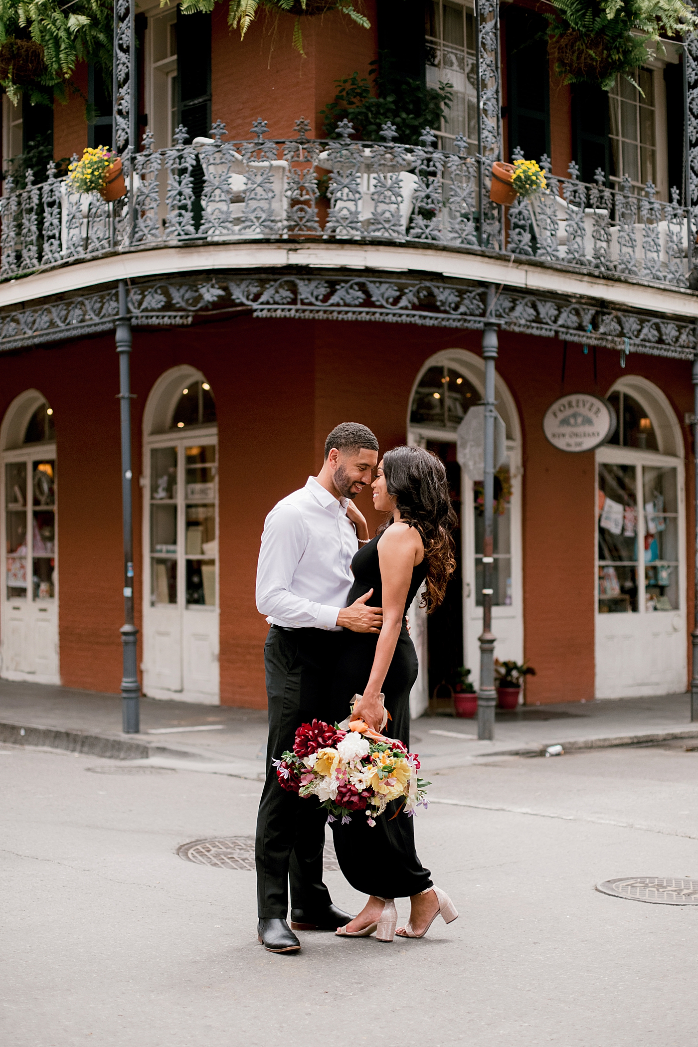 Couple snuggling together during their New Orleans Engagement Session | Photo by Hope Helmuth Photography
