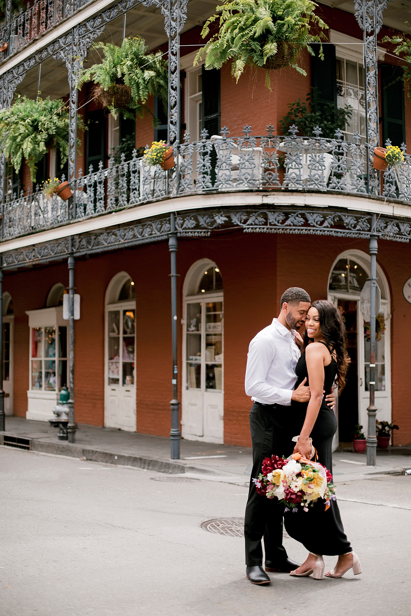 Couple posing in the french quarter during their New Orleans Engagement Session | Photo by Hope Helmuth Photography
