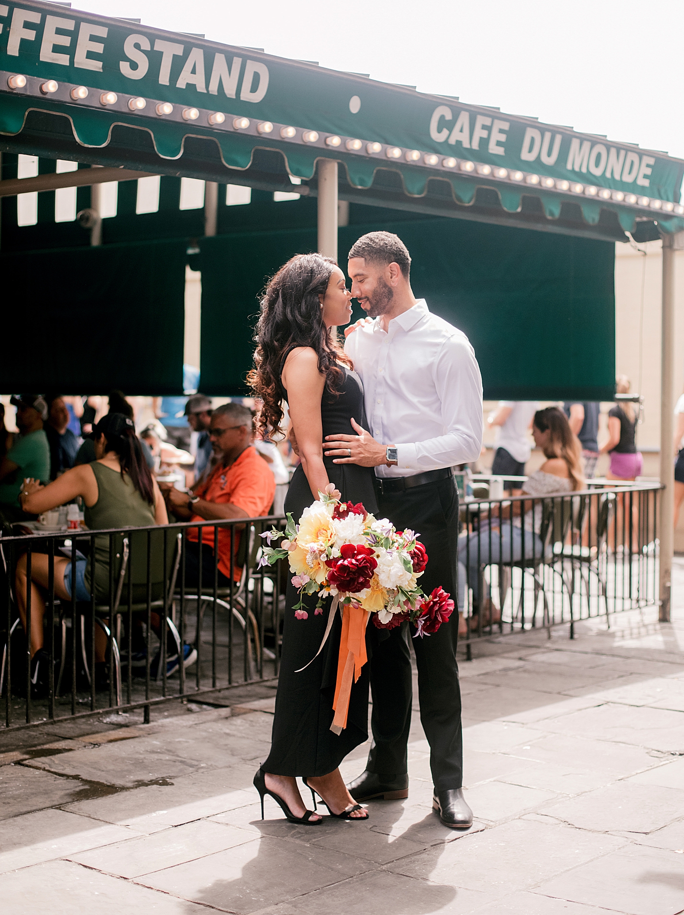 Couple snuggling during their New Orleans Engagement Session | Photo by Hope Helmuth Photography