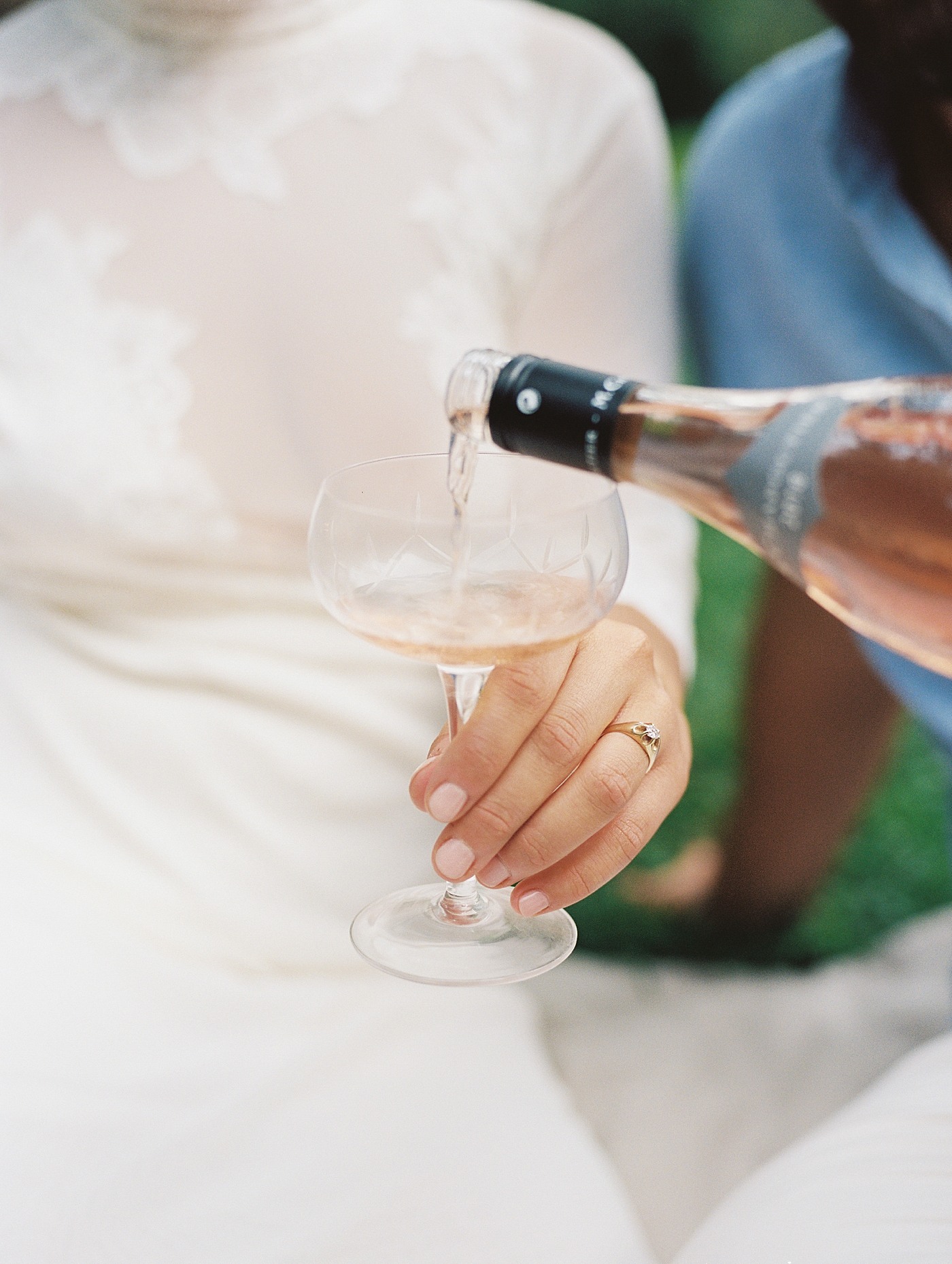 Detail of rose being poured into a flute | Styling and Planning Engagement Sessions with Hope Helmuth Photography
