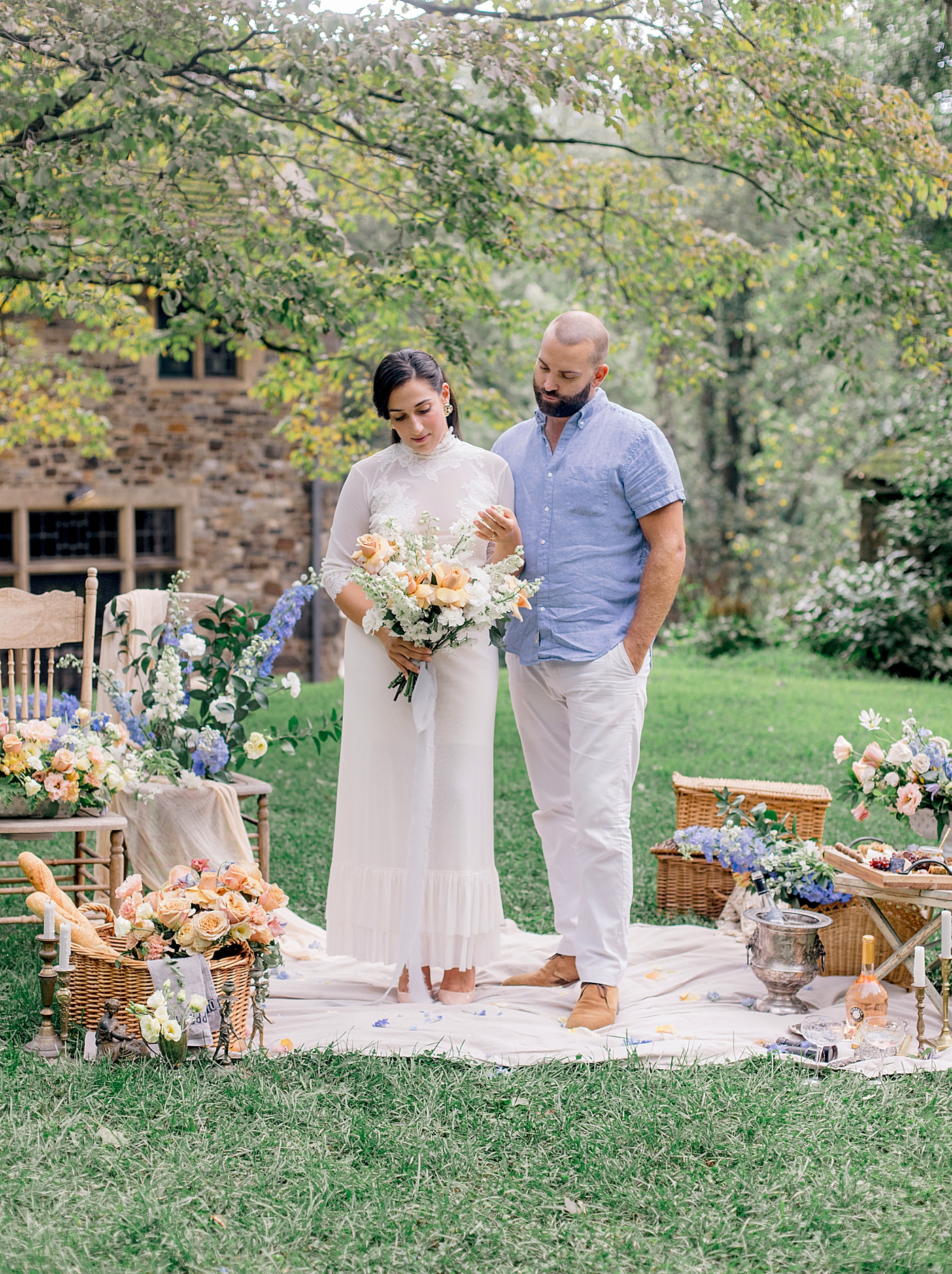 Bride and groom having a picnic together | Image by Hope Helmuth Photography