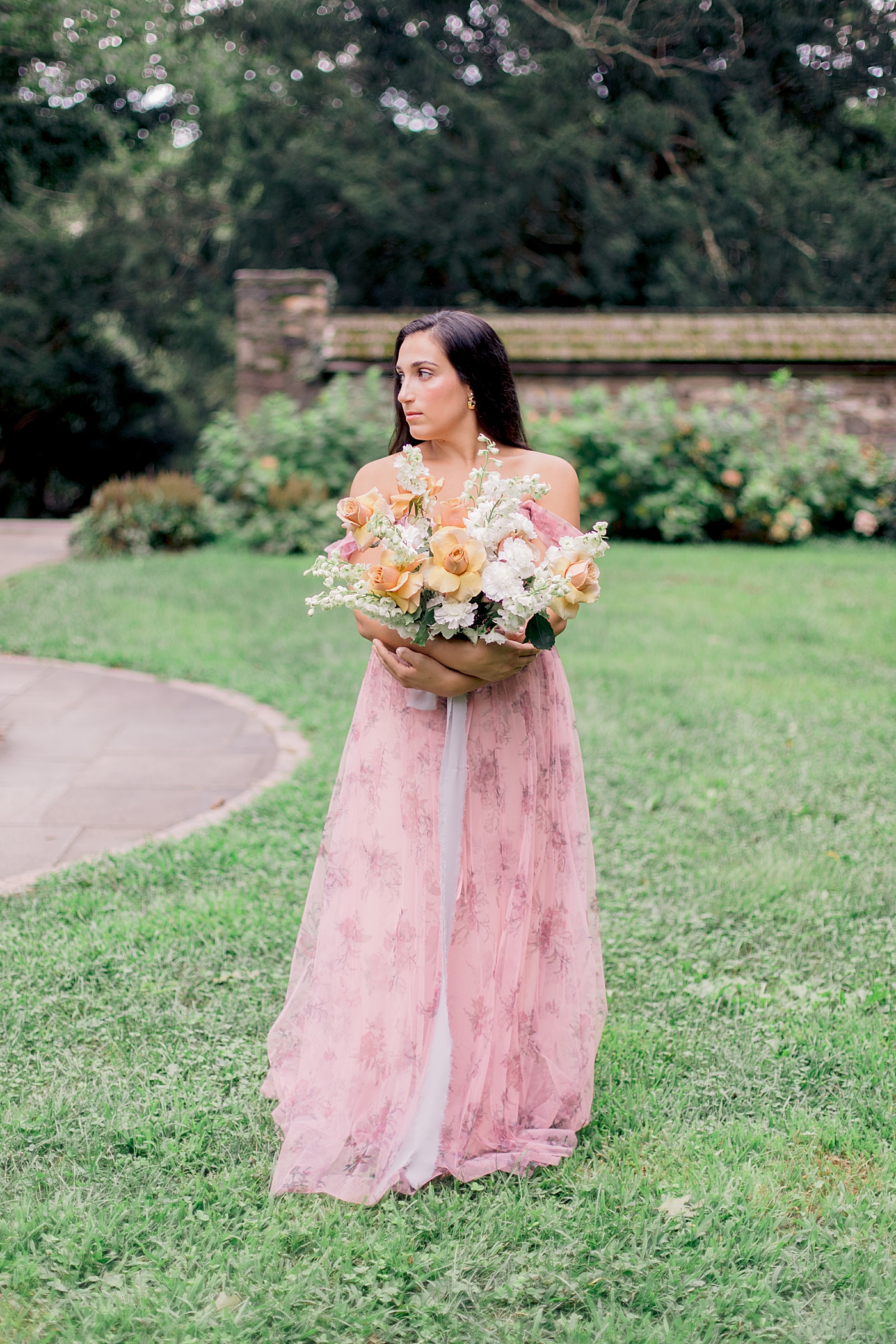 Bride in a pink dress holding a bouquet | Styling and Planning Engagement Sessions with Hope Helmuth Photography