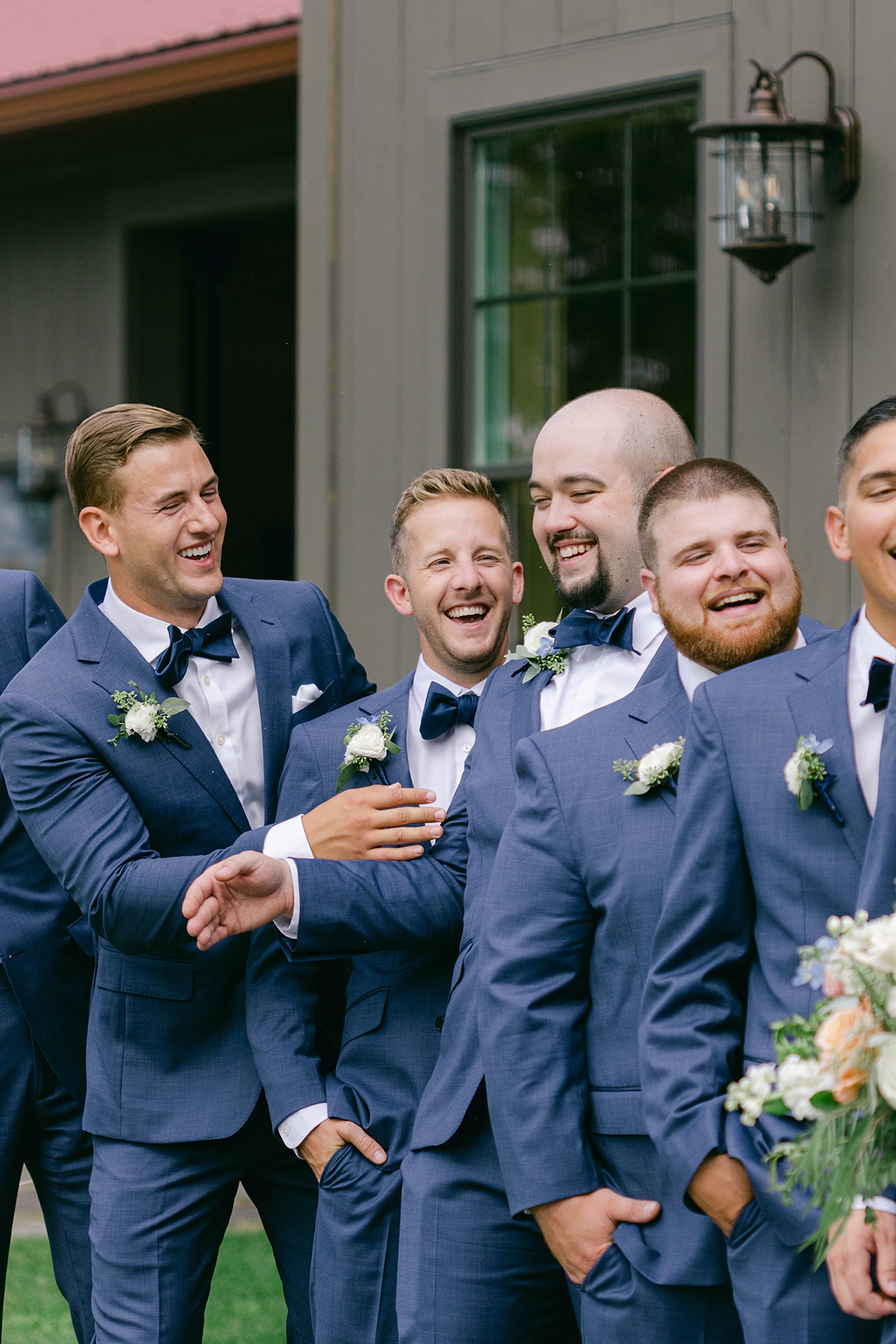Groomsmen laughing together | Image by Hudson Valley Wedding Photographer Hope Helmuth