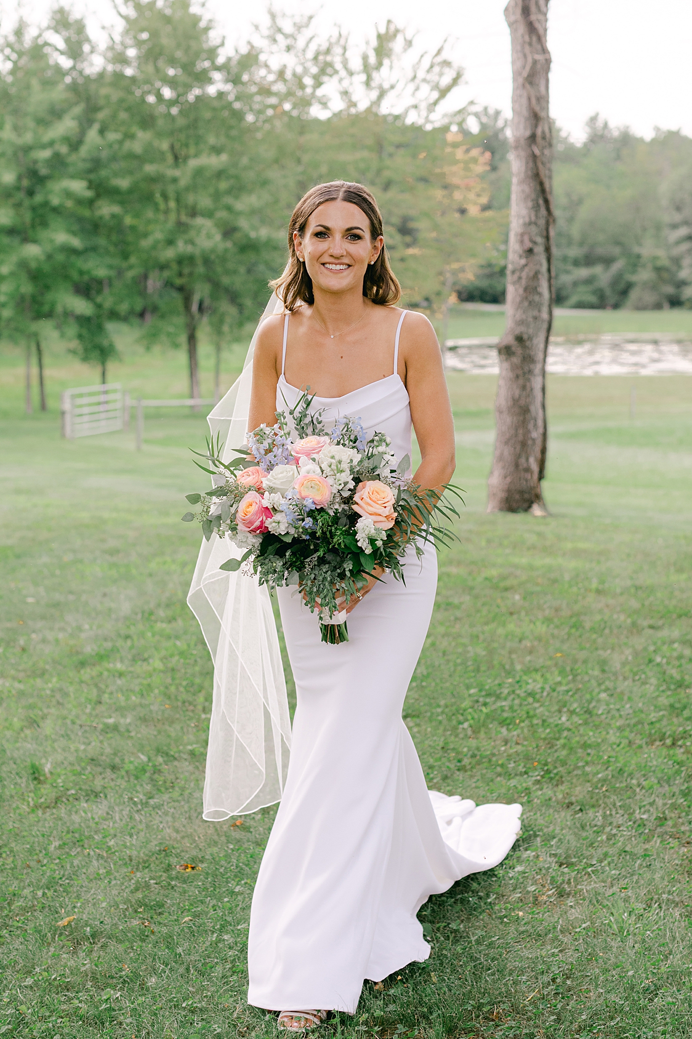 Bridal portrait with bouquet | Image by Hope Helmuth Photography