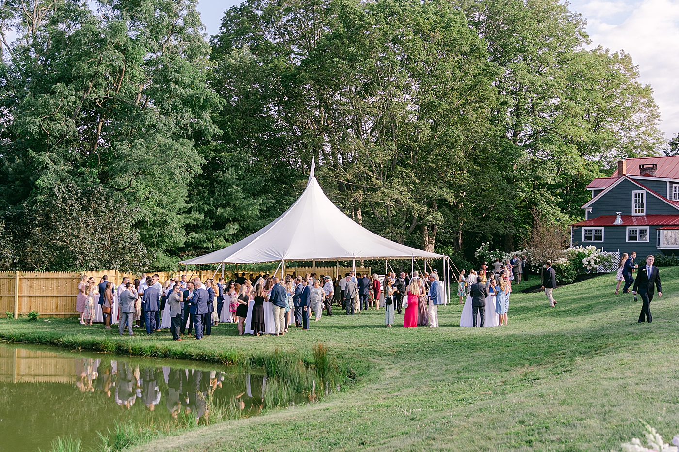 Cocktail hour tent during intimate wedding | Image by Hope Helmuth Photography