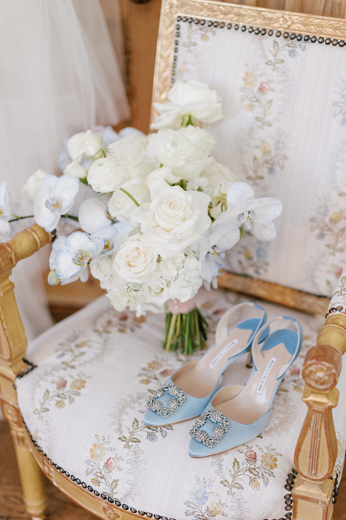 Bridal bouquet with light blue wedding heels | Image by Hope Helmuth Photography