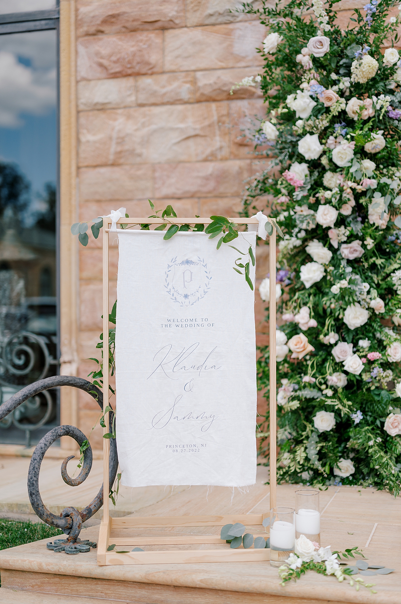 Cloth wedding sign with custom calligraphy | Image by Hope Helmuth Photography