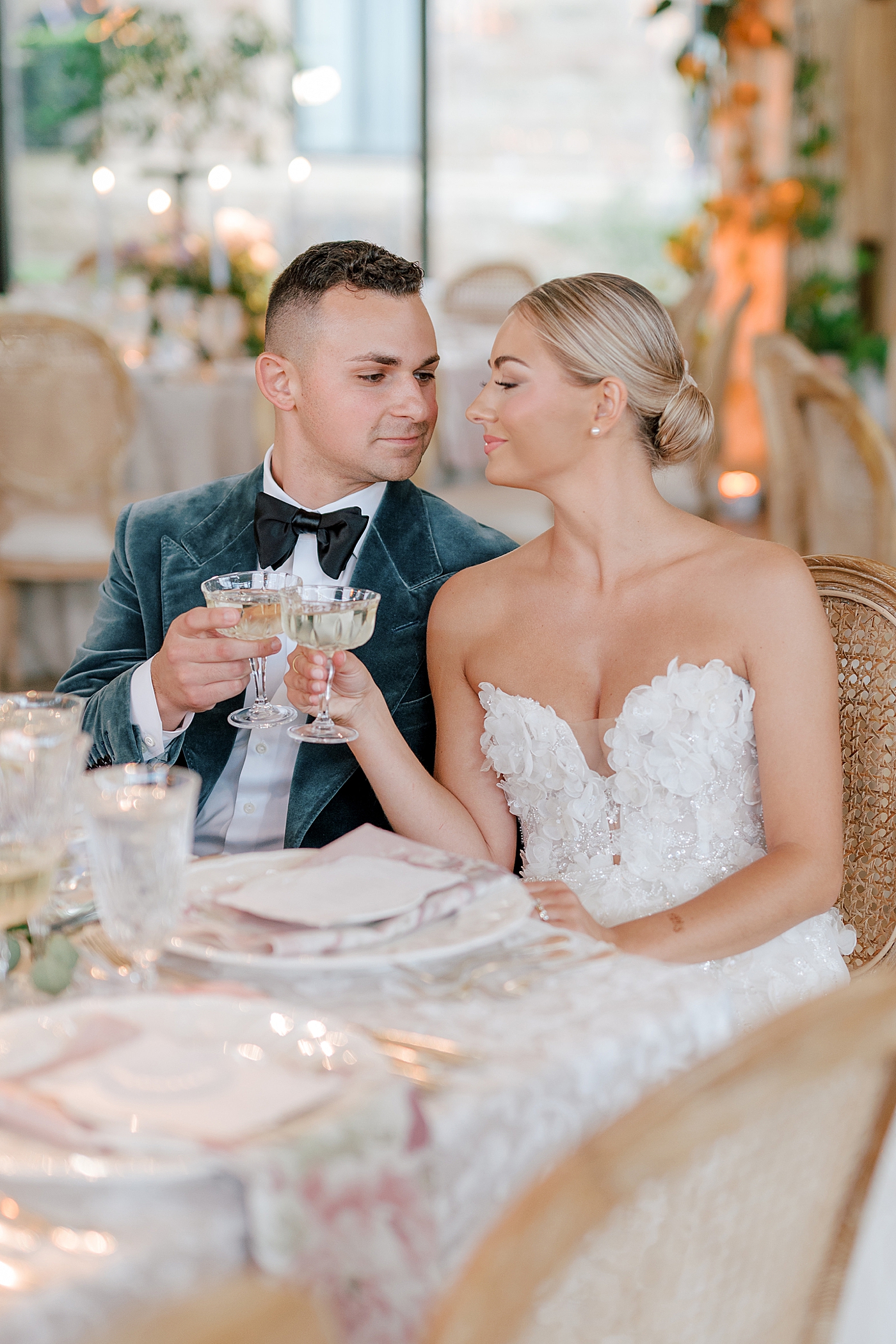 Bride and groom toast during their reception | Image by Hope Helmuth Photography
