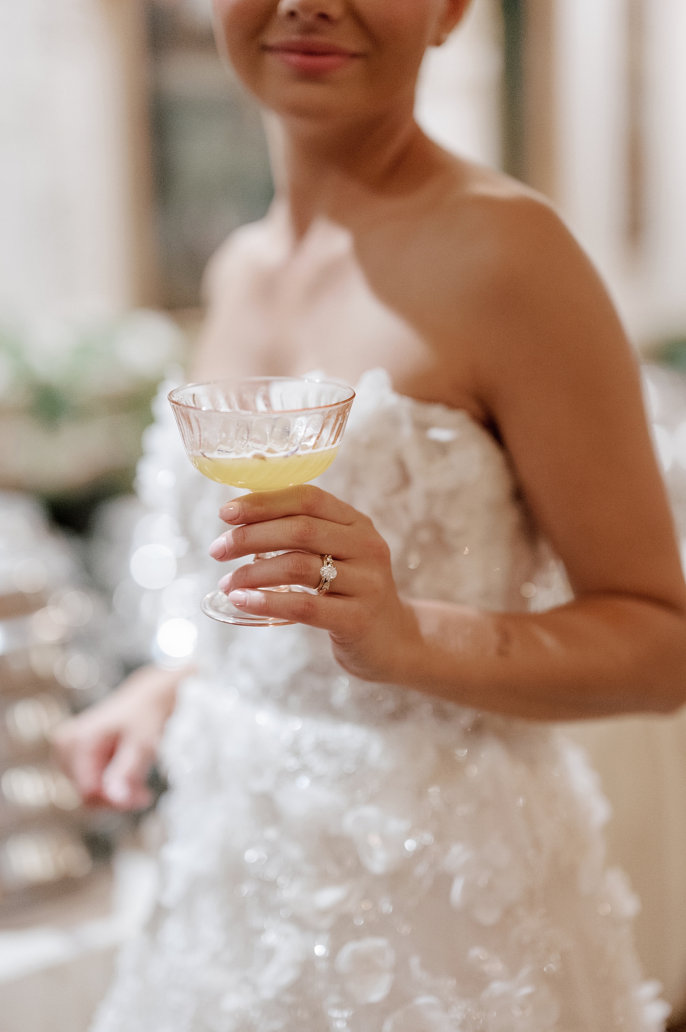 Detail of bride with champagne flute | Image by Hope Helmuth Photography