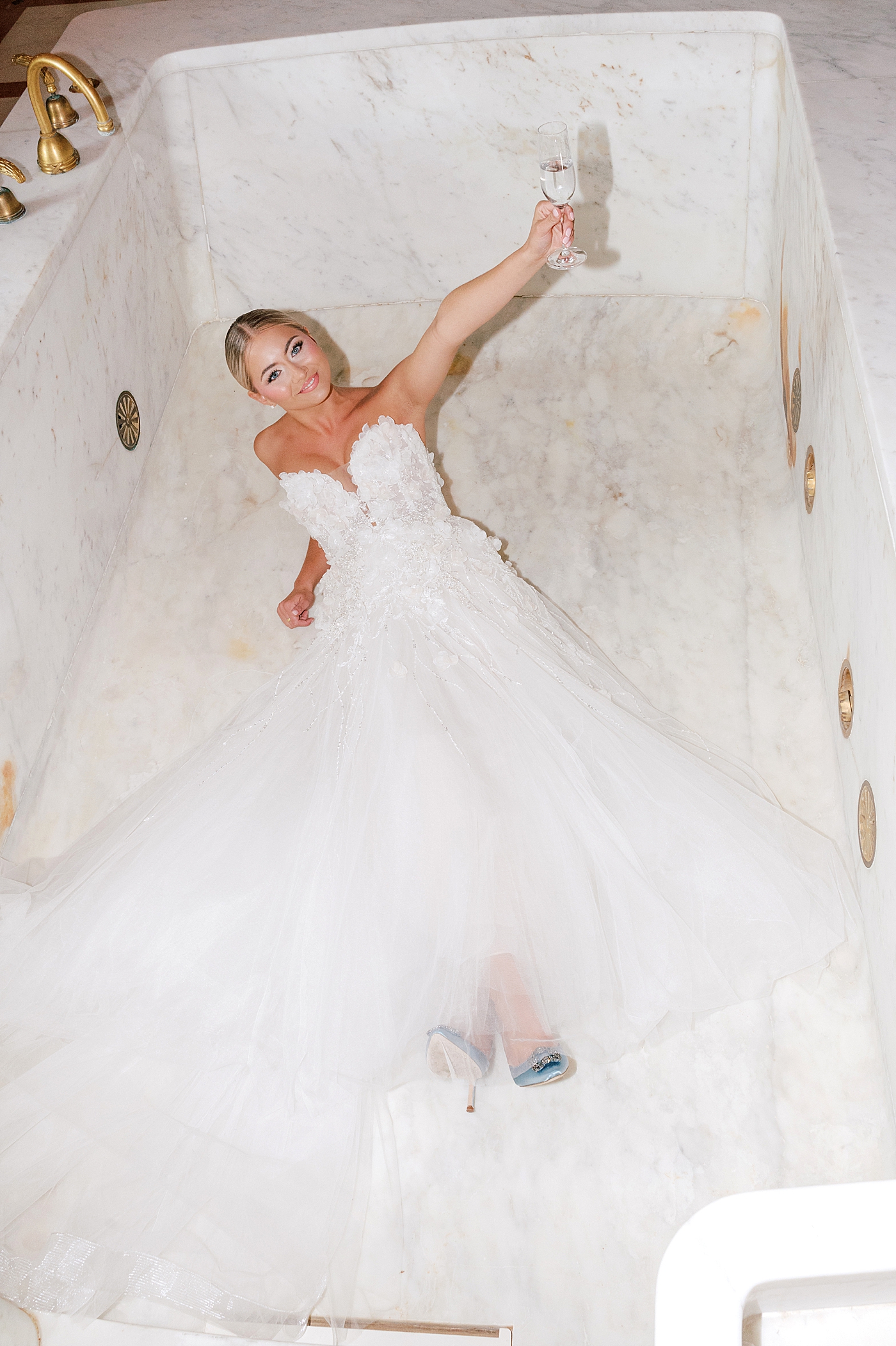 Bridal portraits in a bathtub | Image by Hope Helmuth Photography