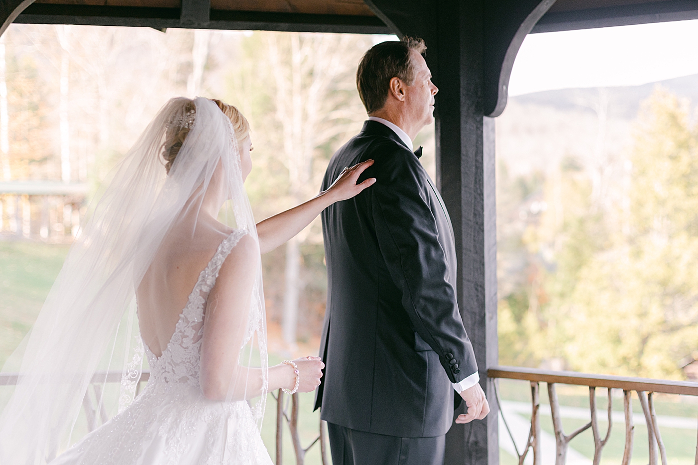 Bride's first look with dad during Lake Placid Lodge Wedding | Image by Hope Helmuth Photography