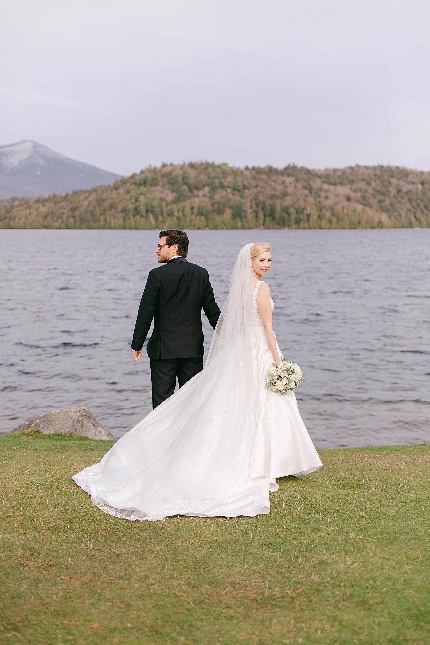 Portrait of bride and groom near Lake Placid | Image by Hope Helmuth Photography