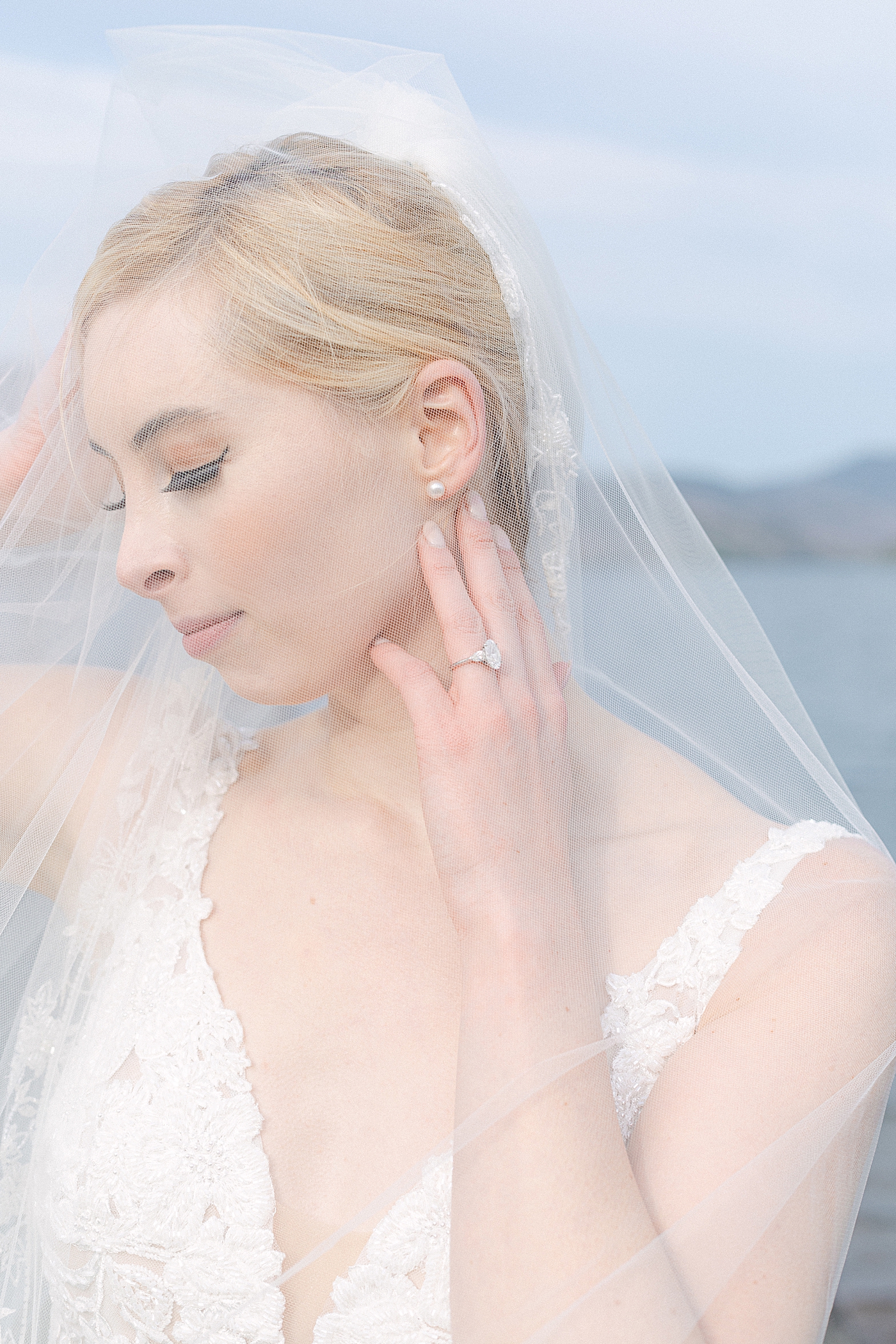 Detail of bride through her veil | Image by Hope Helmuth Photography