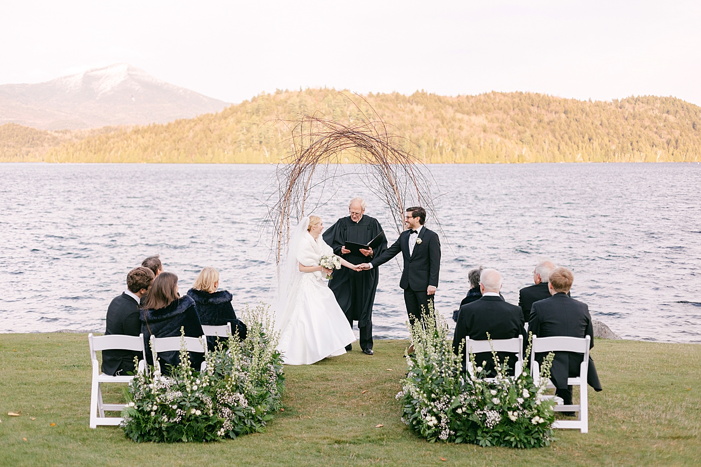 Intimate wedding ceremony on Lake Placid | Image by Hope Helmuth Photography