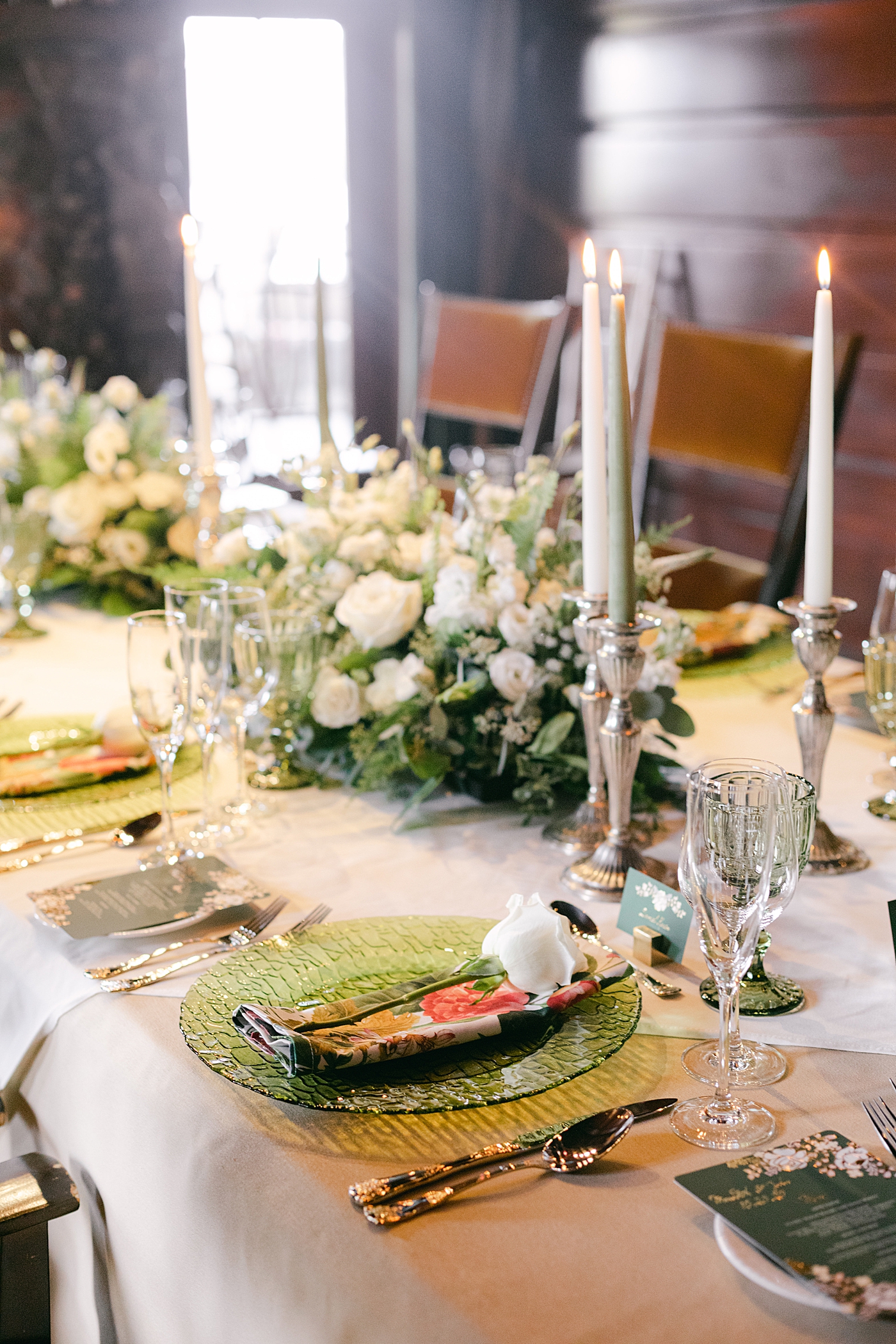 Reception table with tapered candles | Image by Hope Helmuth Photography