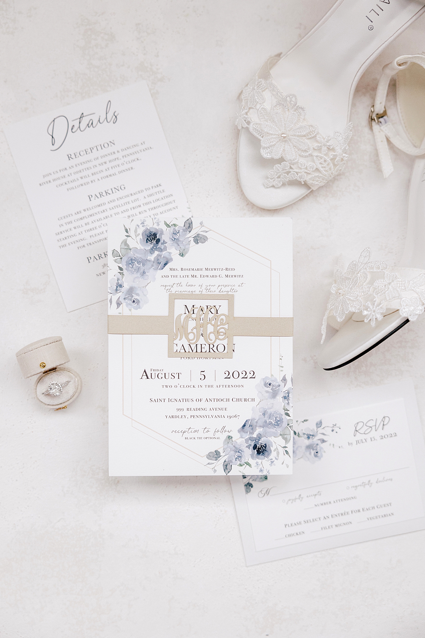 Wedding invitation styled with bridal shoes during River House Odette's Wedding | Image by Hope Helmuth Photography