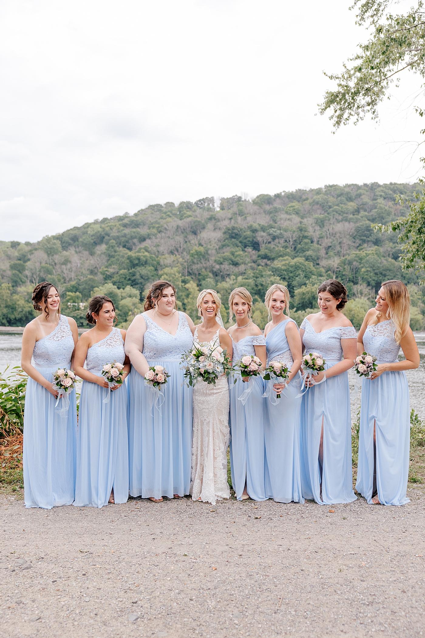 Bride with her bridesmaids | Image by Hope Helmuth Photography
