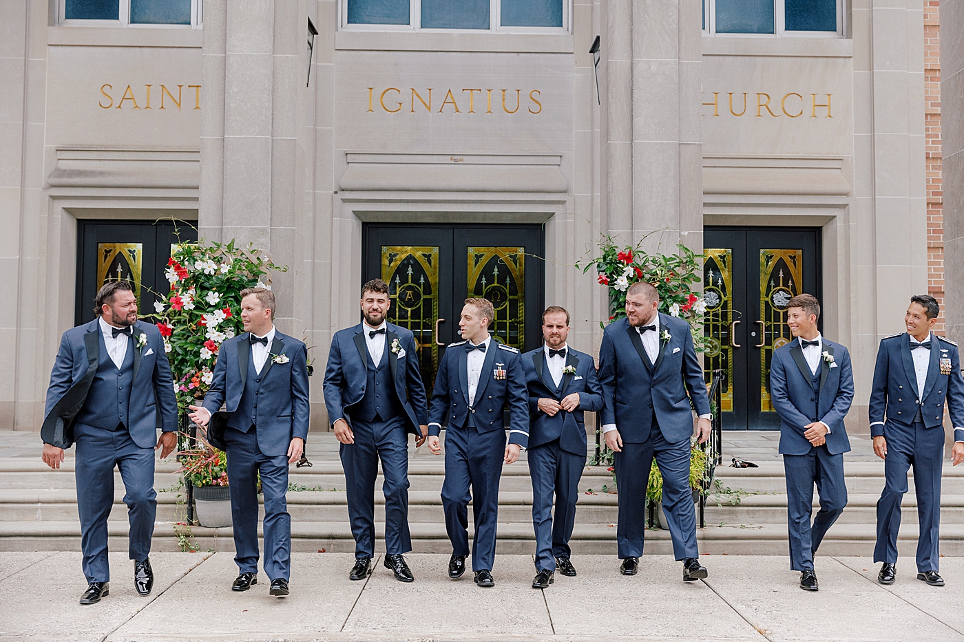 Groomsmen walking in a line | Image by Hope Helmuth Photography