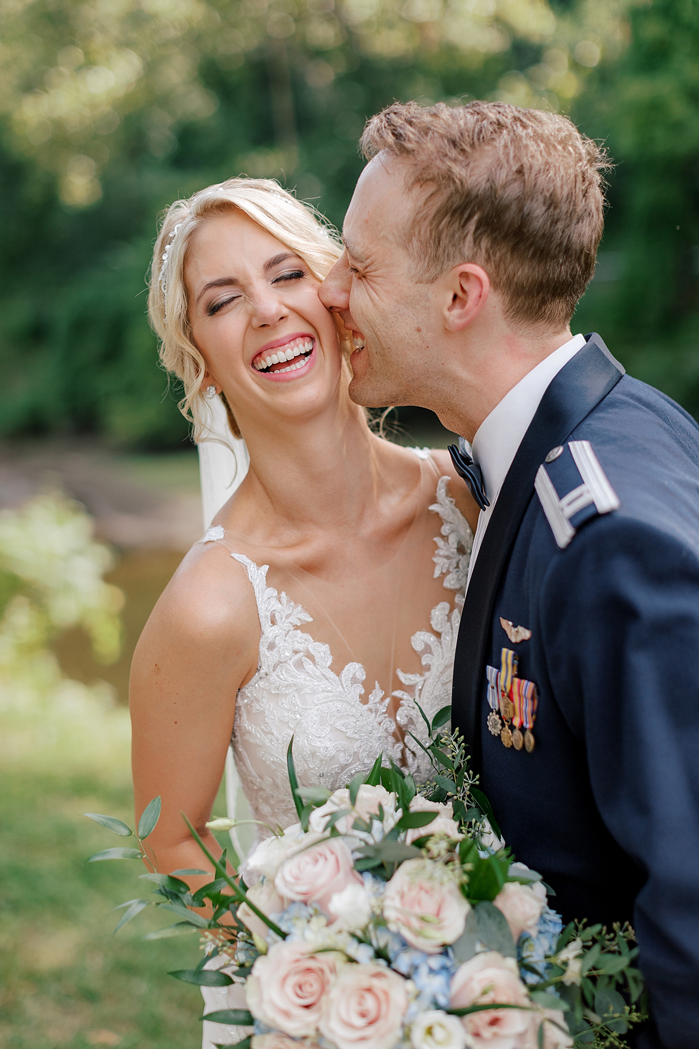 Bride and groom laughing | Image by Hope Helmuth Photography