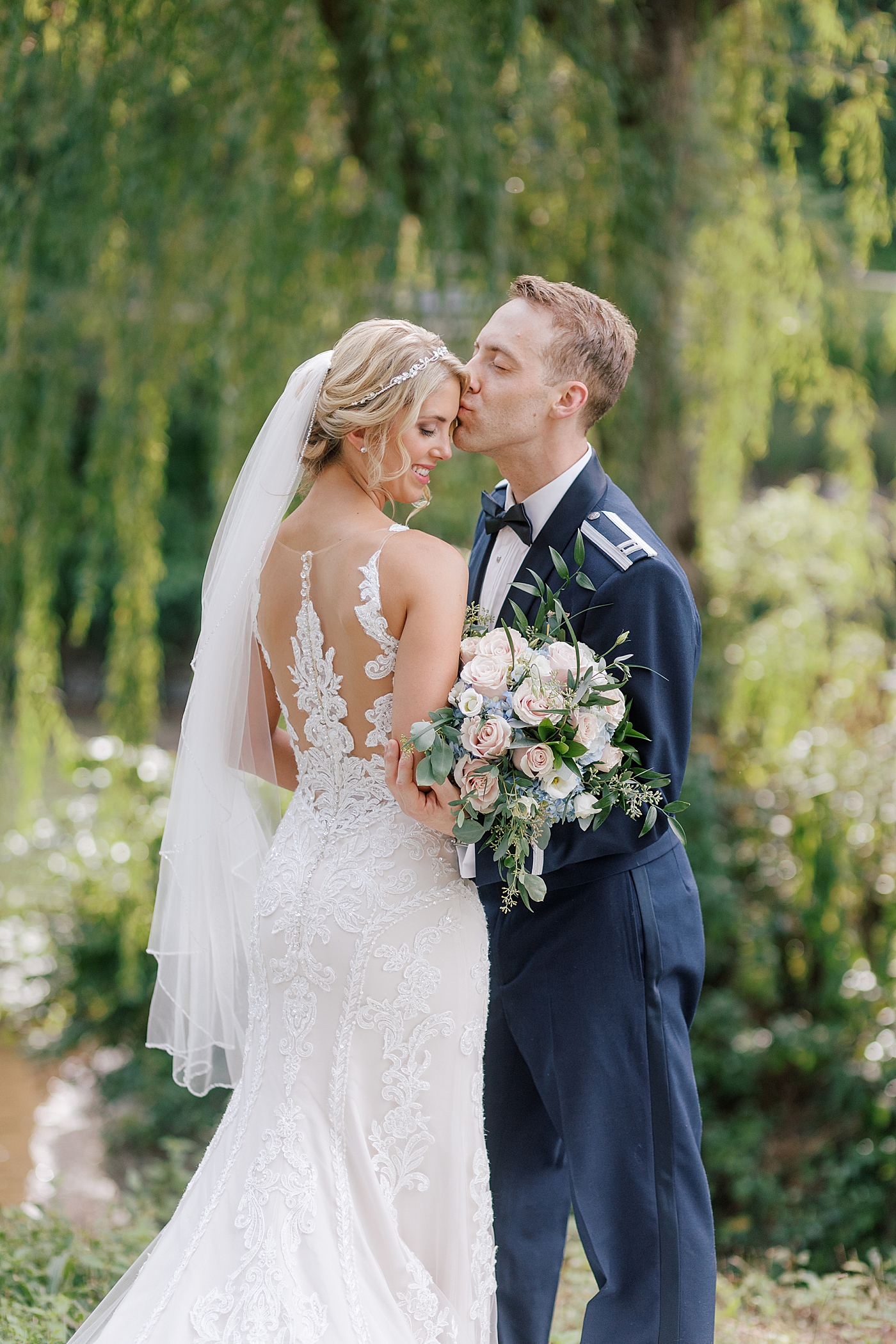 Bride and groom embrace after River House Odette's Wedding | Image by Hope Helmuth Photography
