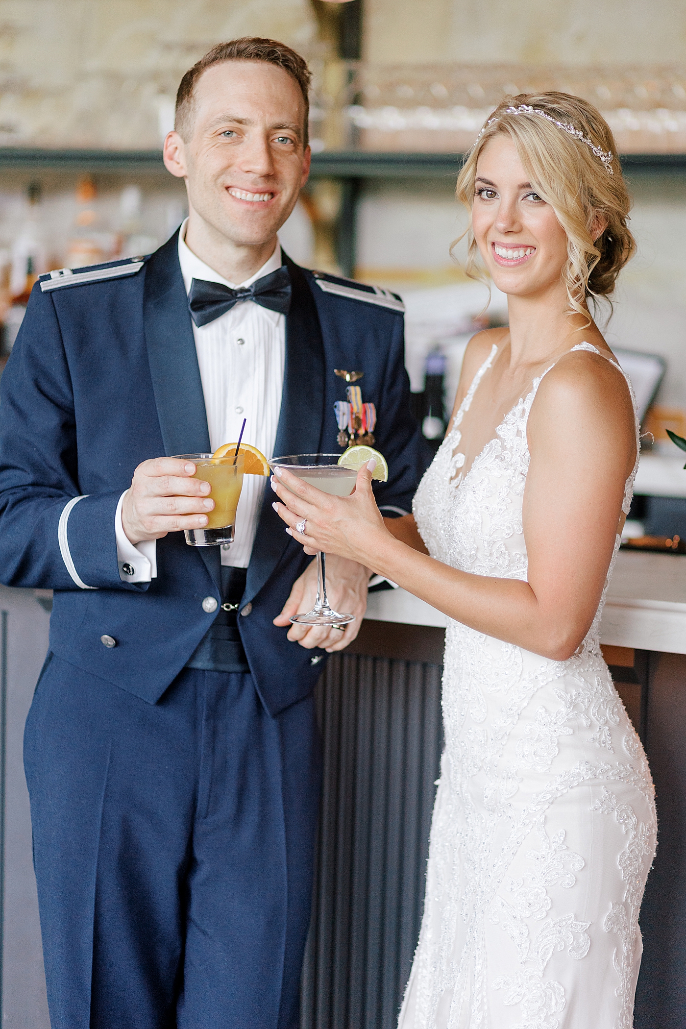 Bride and groom with cocktails during River House Odette's Wedding | Image by Hope Helmuth Photography