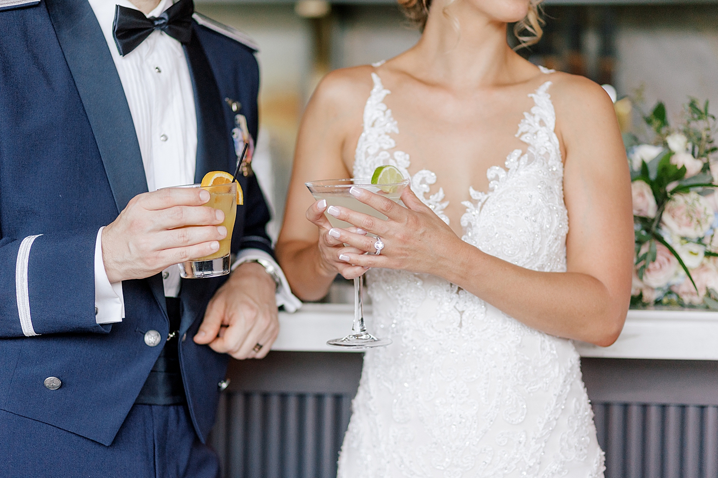 Detail of bride and groom with cocktails during River House Odette's Wedding | Image by Hope Helmuth Photography