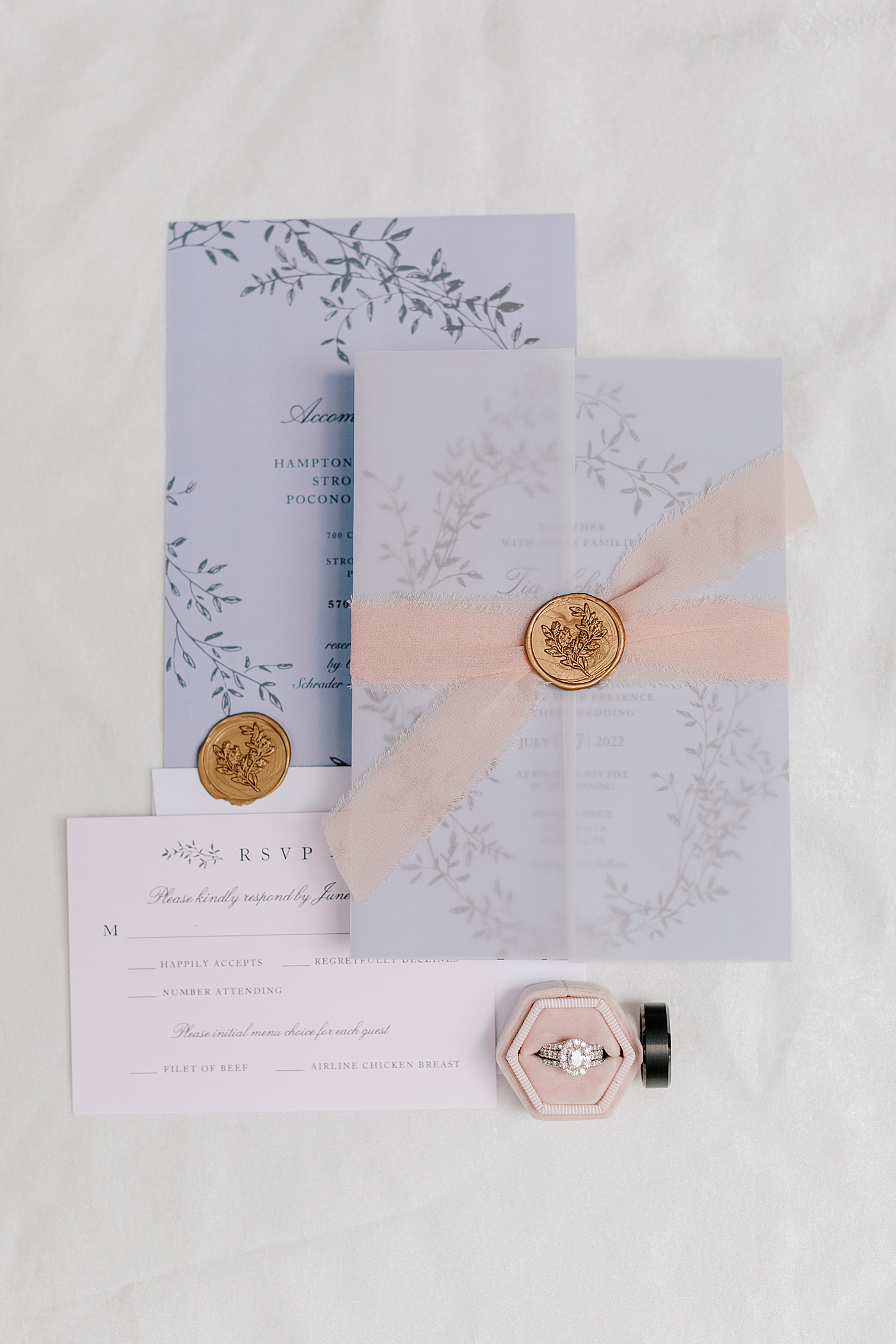 Wedding invitation on a white background | Image by Hope Helmuth Photography 